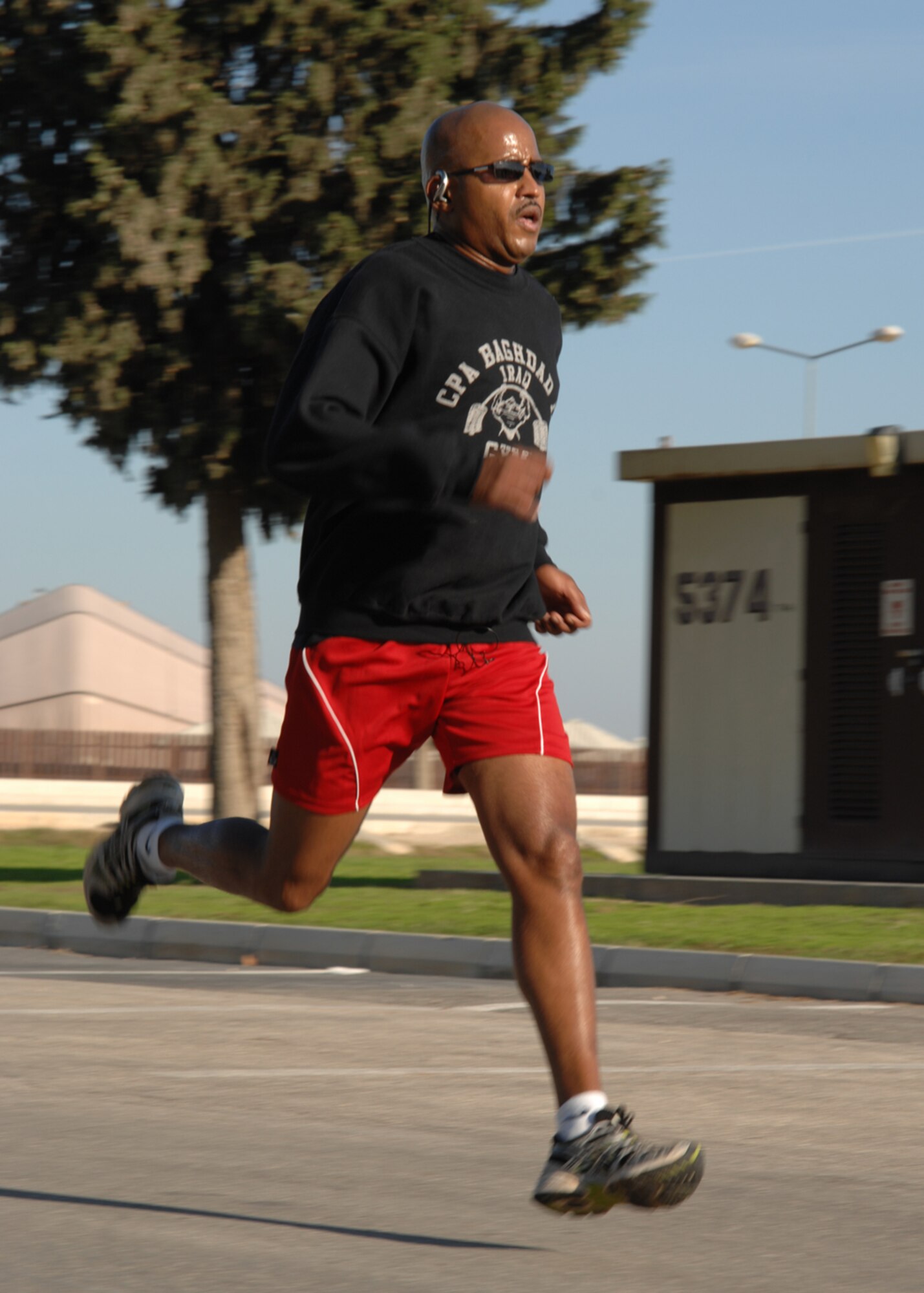 Master Sgt. Hiram Banuchi, 39th Communications Squadron, runs in the 5K Turkey Trot Saturday, Nov. 21, 2009, at Incirlik Air Base, Turkey. Capt. Andrew Beckett, 817th Expeditionary Airlift Squadron crossed the finish line first with a time of 17 minutes 36 seconds. The fitness center hosted the event and AAFES gift cards were given to the first two males and first female to cross the finish line. (U.S. Air Force photo/Staff Sgt. Lauren Padden) 