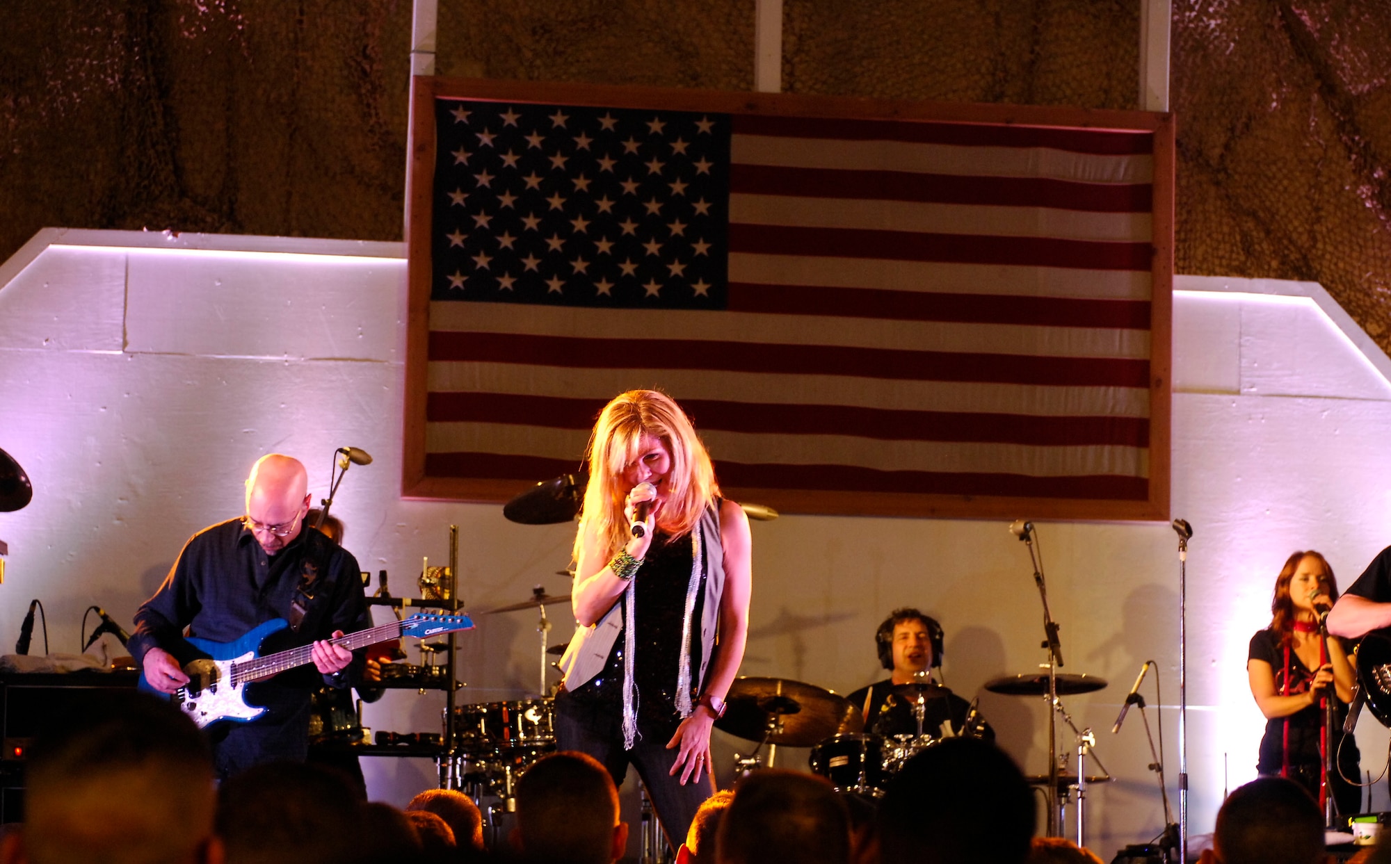 BAGRAM AIRFIELD, Afghanistan -- Gary Sinise and Kimo Williams met in 1997 while working together on a play called "A Streetcar Named Desire," in Chicago. They continued to meet and have jam sessions on the guitar and bass, gradually adding other musicians. The Lt. Dan Band did their first USO tour in 2004, visiting Korea, Singapore and Diego Garcia - since then they average 30-40 shows a year, with 75% of the profits going towards the USO and other charities. The band name was chosen because Mr. Sinise was constantly recognized by a character he played in the movie "Forrest Gump" called Lt. Dan. (U.S. Air Force photo/ Senior Airman Susan Tracy)