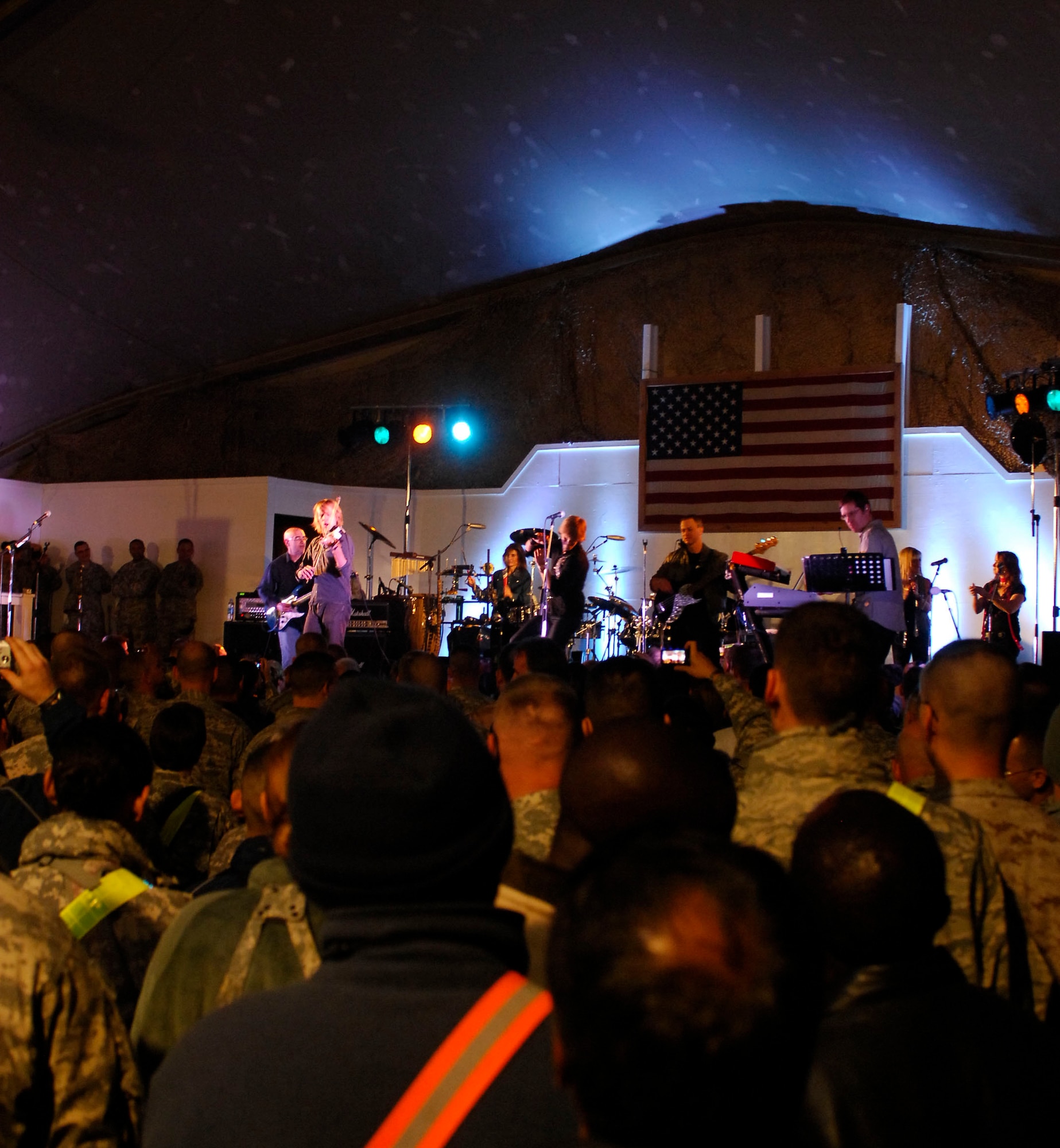 BAGRAM AIRFIELD, Afghanistan -- Gary Sinise and Kimo Williams met in 1997 while working together on a play called "A Streetcar Named Desire," in Chicago. They continued to meet and have jam sessions on the guitar and bass, gradually adding other musicians. The Lt. Dan Band did their first USO tour in 2004, visiting Korea, Singapore and Diego Garcia - since then they average 30-40 shows a year, with 75% of the profits going towards the USO and other charities. The band name was chosen because Mr. Sinise was constantly recognized by a character he played in the movie "Forrest Gump" called Lt. Dan. (U.S. Air Force photo/ Senior Airman Susan Tracy)