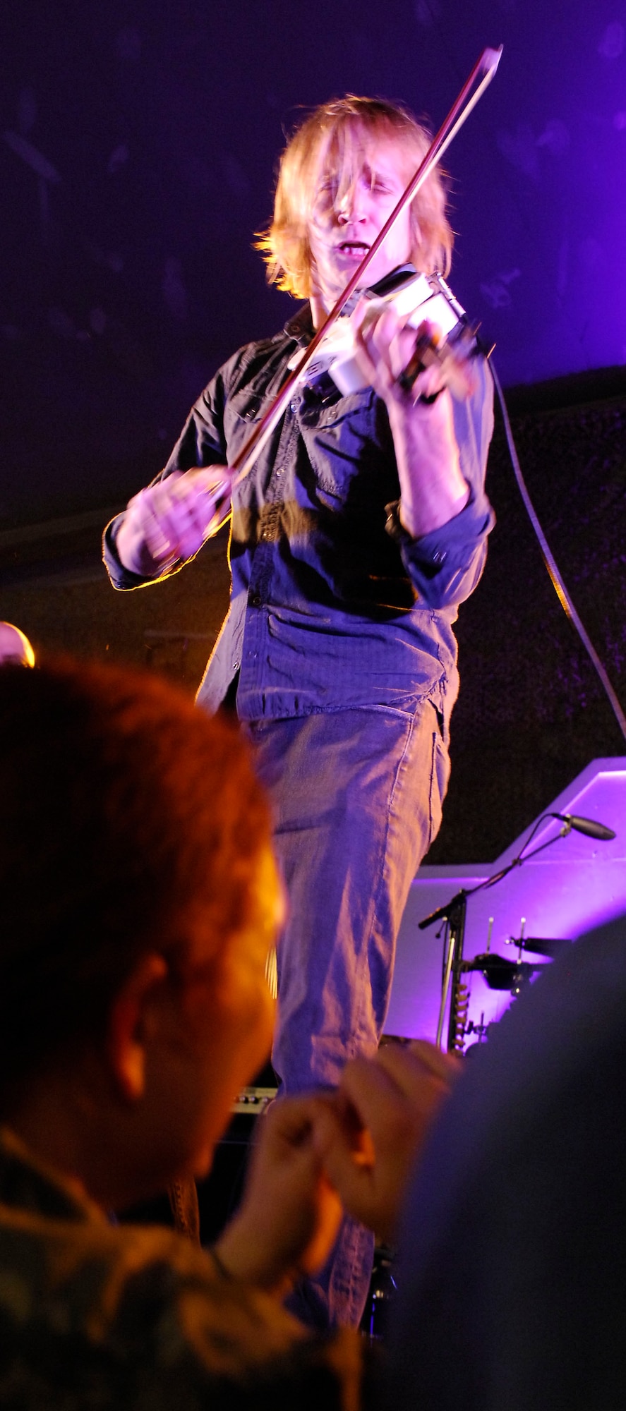 BAGRAM AIRFIELD, Afghanistan -- Gary Sinise and Kimo Williams met in 1997 while working together on a play called "A Streetcar Named Desire," in Chicago. They continued to meet and have jam sessions on the guitar and bass, gradually adding other musicians. The Lt. Dan Band did their first USO tour in 2004, visiting Korea, Singapore and Diego Garcia - since then they average 30-40 shows a year, with 75% of the profits going towards the USO and other charities. The band name was chosen because Mr. Sinise was constantly recognized by a character he played in the movie "Forrest Gump" called Lt. Dan. (U.S. Air Force photo/ Senior Airman Susan Tracy)