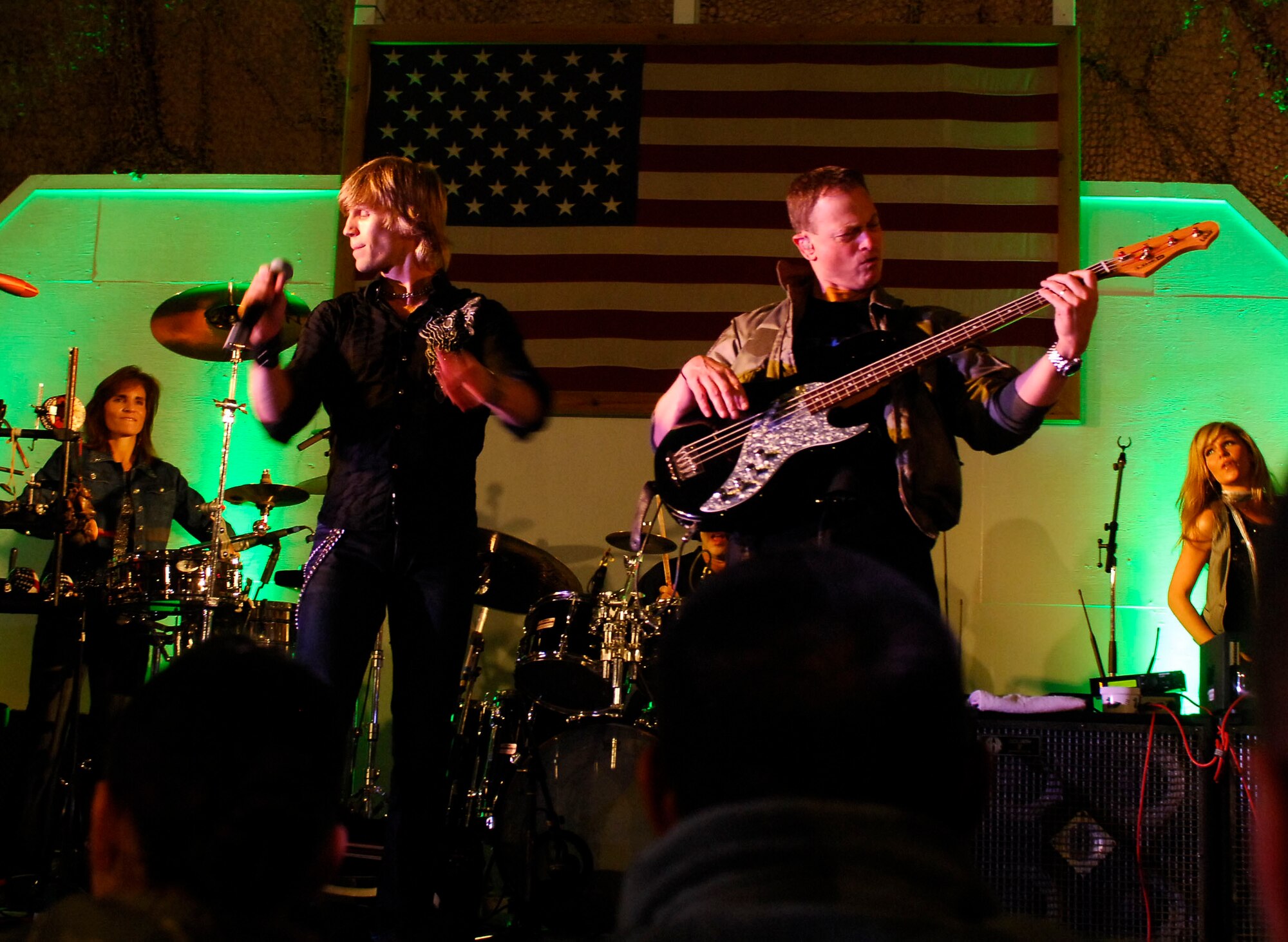 BAGRAM AIRFIELD, Afghanistan -- Gary Sinise and Kimo Williams met in 1997 while working together on a play called "A Streetcar Named Desire," in Chicago. They continued to meet and have jam sessions on the guitar and bass, gradually adding other musicians. The Lt. Dan Band did their first USO tour in 2004, visiting Korea, Singapore and Diego Garcia - since then they average 30-40 shows a year, with 75% of the profits going towards the USO and other charities. The band name was chosen because Mr. Sinise was constantly recognized by a character he played in the movie "Forrest Gump" called Lt. Dan. (U.S. Air Force photo/ Senior Airman Susan Tracy)