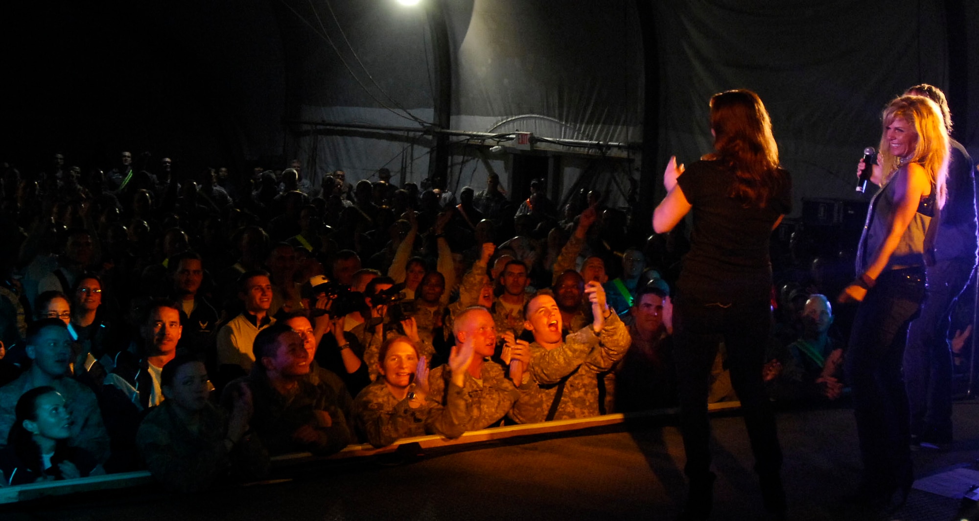 BAGRAM AIRFIELD, Afghanistan -- Gary Sinise and Kimo Williams met in 1997 while working together on a play called "A Streetcar Named Desire," in Chicago. They continued to meet and have jam sessions on the guitar and bass, gradually adding other musicians. The Lt. Dan Band did their first USO tour in 2004, visiting Korea, Singapore and Diego Garcia - since then they average 30-40 shows a year, with 75% of the profits going towards the USO and other charities. The band name was chosen because Mr. Sinise was constantly recognized by a character he played in the movie "Forrest Gump" called Lt. Dan. (U.S. Air Force photo/ Senior Airman Susan Tracy)