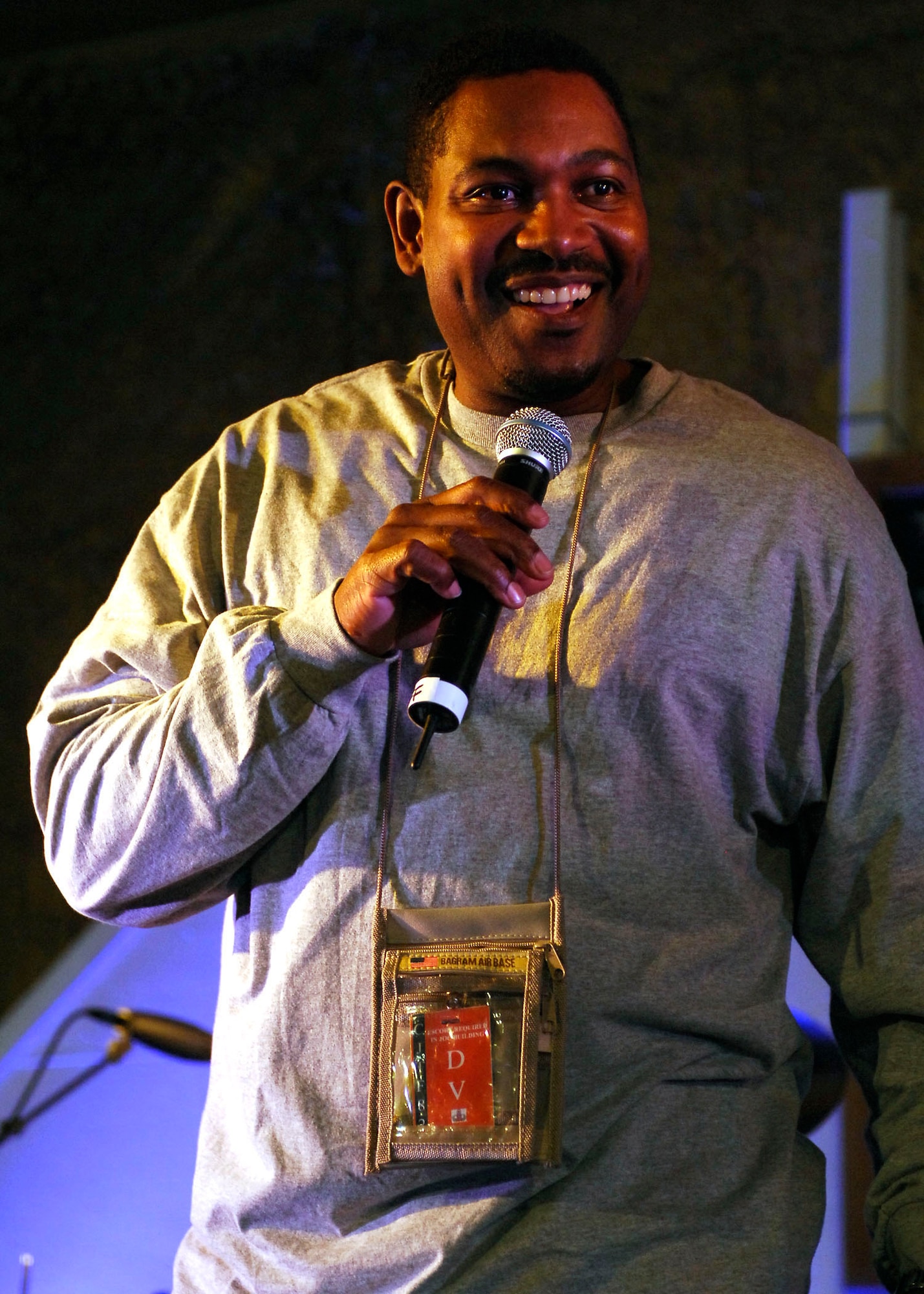 BAGRAM AIRFIELD, Afghanistan -- Mykelti Williamson onstage during a USO tour with the Lt. Dan Band in Bagram Airfield, Afghanistan. The Lt. Dan Band did their first USO tour in 2004, visiting Korea, Singapore and Diego Garcia - since then they average 30-40 shows a year, with 75% of the profits going towards the USO and other charities. The band name was chosen because Mr. Sinise was constantly recognized by a character he played in the movie "Forrest Gump" called Lt. Dan. (U.S. Air Force photo/ Senior Airman Susan Tracy)