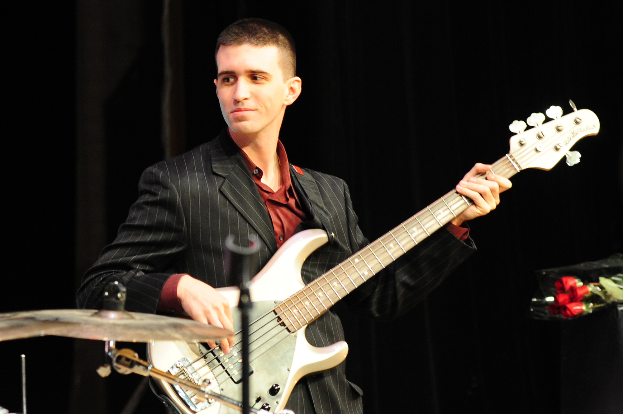 BISHKEK, Kyrgyzstan -- Senior Airman Andrew Peck, U.S. Air Forces Central Sirocco Band bass guitarist, performs in Kyrgyzstan, Nov. 16, 2009. (U.S. Air Force photo/Senior Airman Steele C. G. Britton)