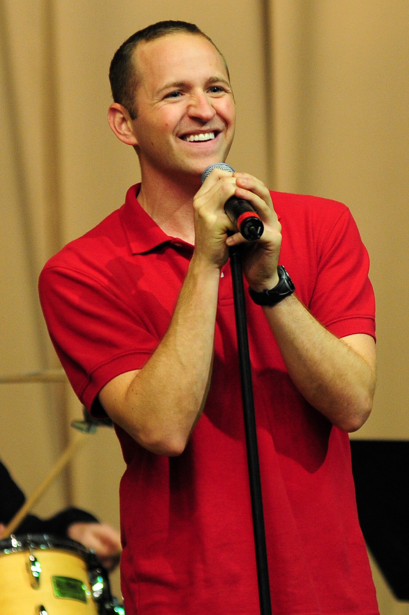 BISHKEK, Kyrgyzstan -- Airman 1st Class Clayton Lee, U.S. Air Forces Central Sirocco Band vocalist, entertains an audience during a performance in Kyrgyzstan, Nov. 13, 2009. (U.S. Air Force photo/Senior Airman Steele C. G. Britton)