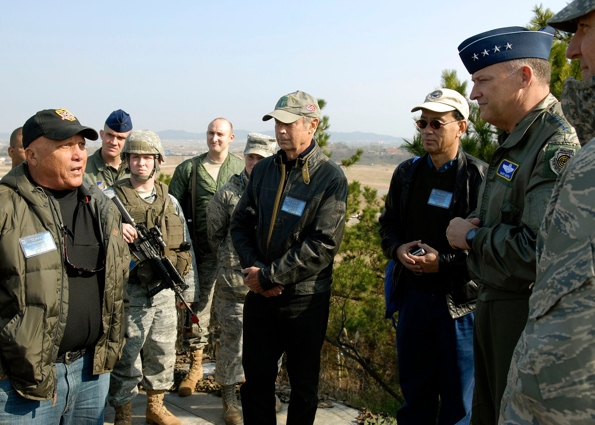 Anthony Guerrero, Jr., Executive Vice President for First Hawaiian Bank, expresses his appreciation and gratitude to Airmen from the 8th Fighter Wing, Kunsan Air Base, Republic of Korea, and Gen. Gary North, Pacific Air Forces commander, after a military assault demonstration Nov. 23. The group of Air Force Civilian Advisory Council members joined General North on a tour of Kunsan and Osan Air Bases, ROK, Nov. 21-26 to get a better understanding of life for Airmen assigned to the ROK. The group traveled from Hickam Air Force Base, Hawaii. (U.S. Air Force photo/Tech. Sgt. Jerome S. Tayborn)