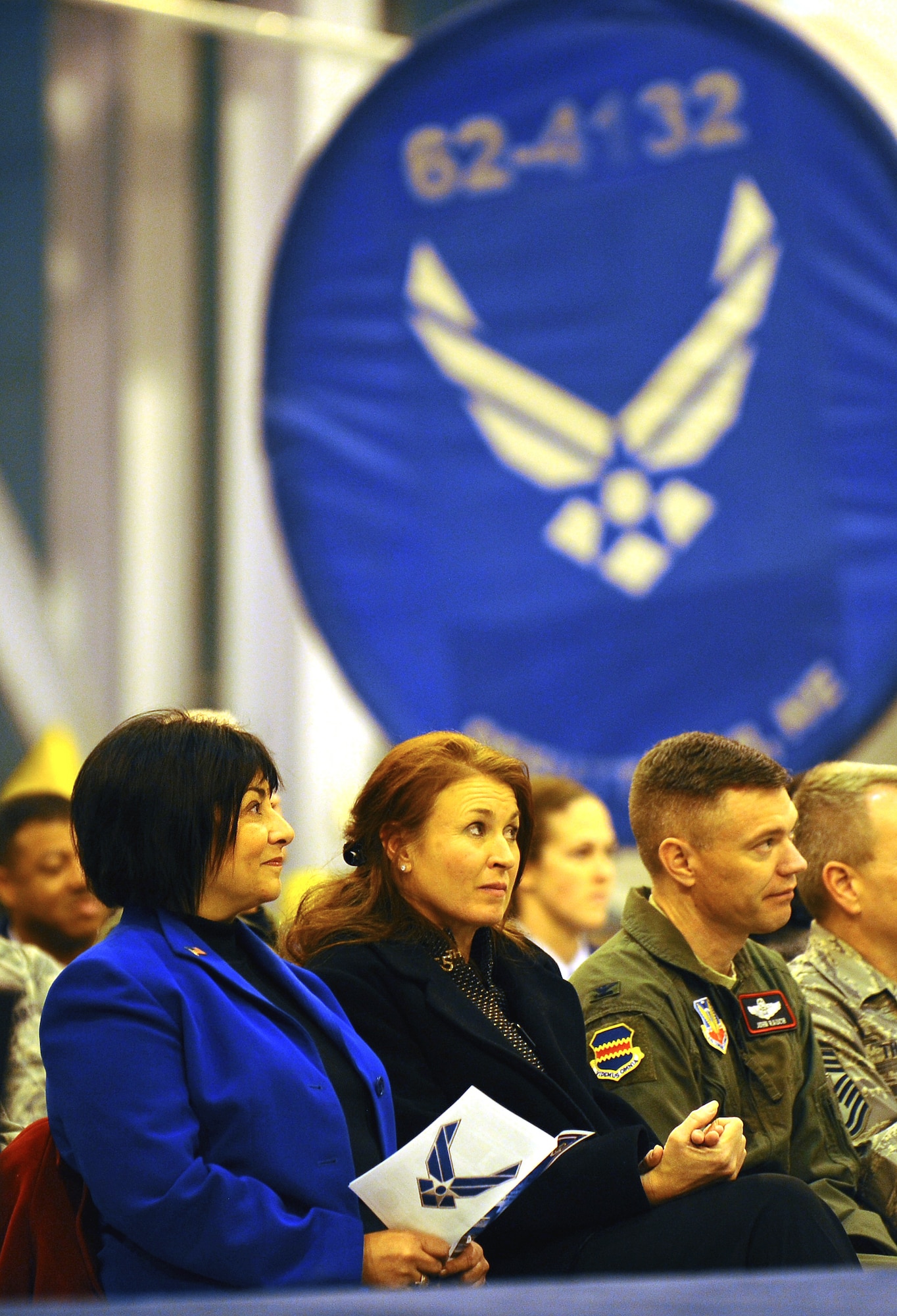OFFUTT AIR FORCE BASE, Neb. - Nebraska's first lady, Sally Ganem and 55th Wing Vice Commander Col. John T. Rauch, attend the promotion ceremony for Lt. Col. Dana C. McCown, 55th Maintenance Squadron commander, at the Bennie Davis Maintenance Facility here Nov. 24. Colonel McCown was also recognized by the first lady of Nebraska, Sally Ganem, who bestowed Colonel McCown with an Admiralship into the Great Navy for the state of Nebraska, for her many contributions to Nebraska's Mothers Against Drunk Driving organization. U.S. Air Force Photo by Josh Plueger
