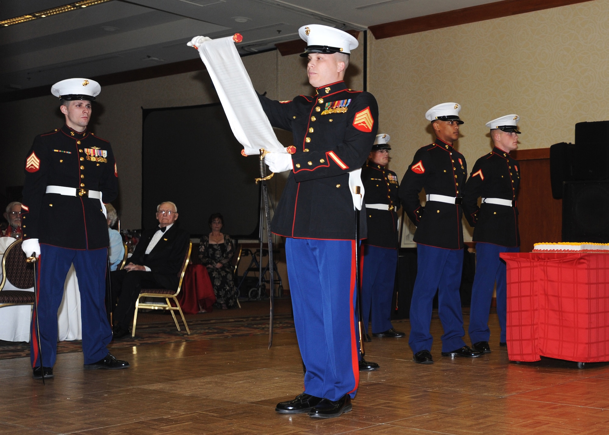 ANCHORAGE, Alaska -- Sgt. Hollis A. Versyp of D Company (-) Anti-Terrorism Battalion 4th Marine Division reads the history of the Marine Corps birthday during the United States Marine Corps 234th Birthday Ball Nov. 21, 2009 at the downtown Anchorage Hilton. The ball was held in memory and in honor of Marines and Sailors past and present, and American citizens around the world who are heroically defending the cause of freedom and liberty. (U.S. Air Force photo/Senior Airman Laura Turner)
