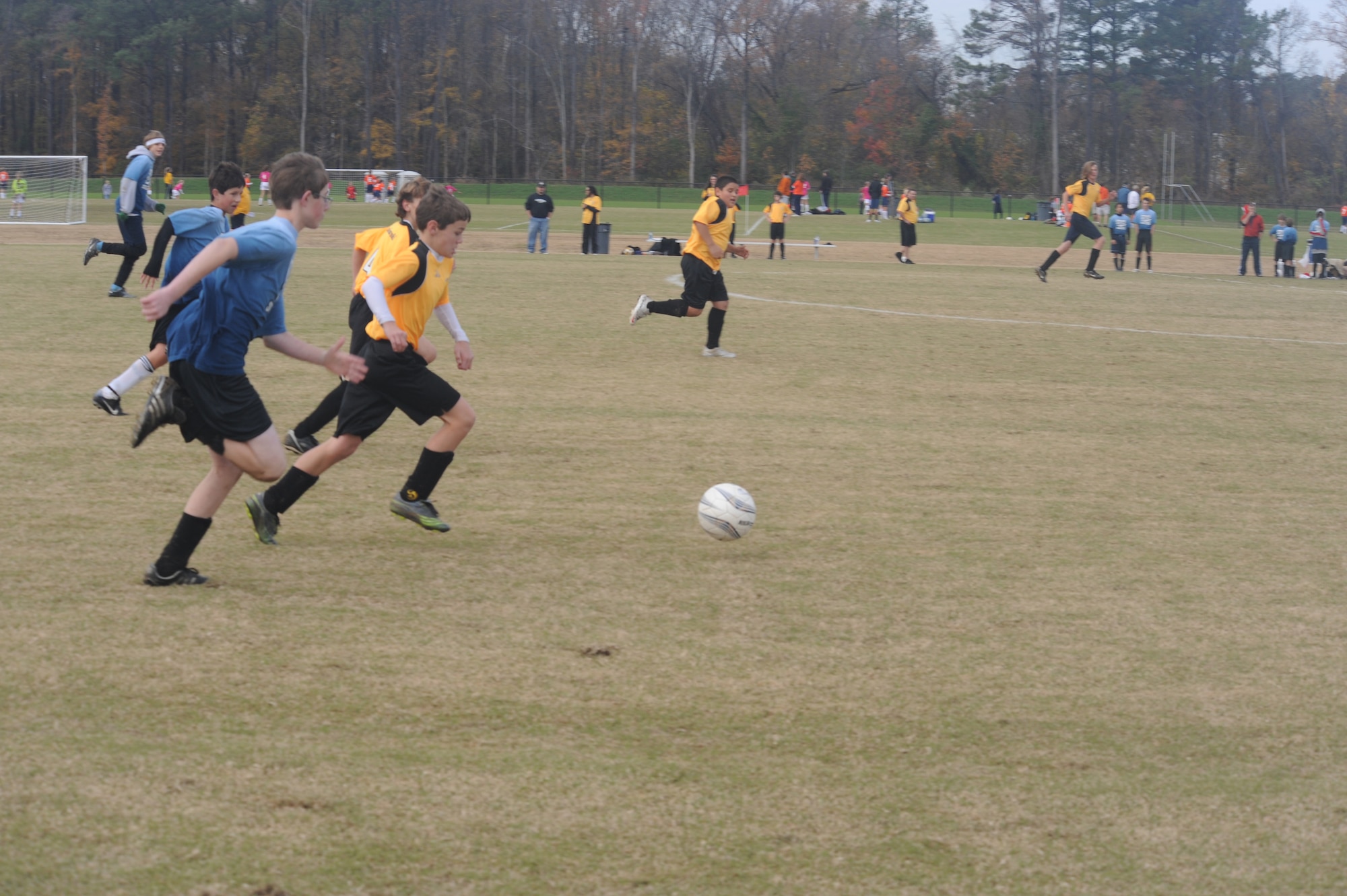 Isaak Cooper, Strike Eagle FC midfielder, hustles to cut a play off during the team’s match against Davidson County during a two-day 2009 State Wide Athletic Counsel Tournament held at the Rocky Mount Sports Complex, in Rocky Mount, N.C., Nov. 21-22, 2009.  Davidson County scored a last minute goal to beat Strike Eagle FC, 3-2. (U.S. Air Force photo/Tech. Sgt. Lesley Waters)