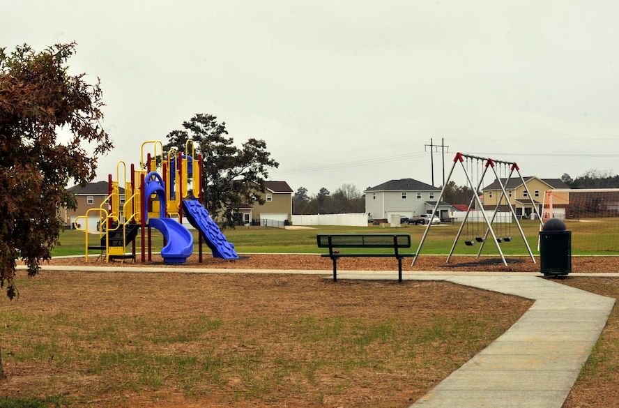 MOODY AIR FORCE BASE, Ga. -- Moody celebrated a milestone after a ribbon
cutting ceremony for the newly-built playground at the Magnolia Grove
housing area here Nov. 24. The housing area and its playground represent the
Air Force's initiative to improve the quality of services available to Air
Force families. (U.S. Air Force photo by Senior Airman Schelli Jones)
 
