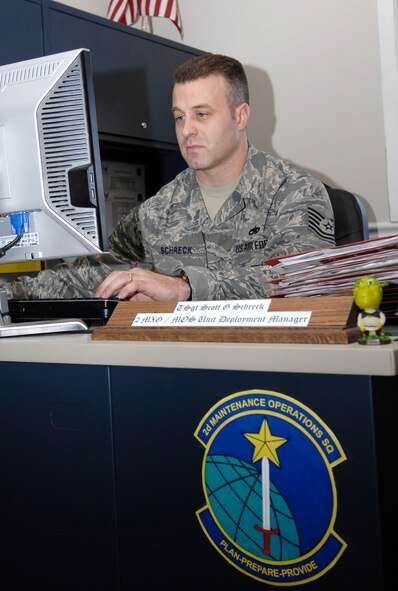 Tech. Sgt. Scott Schreck, 2d Maitenance Operations Squadron, reviews deployment taskings as part of his job as a unit deployment manager.