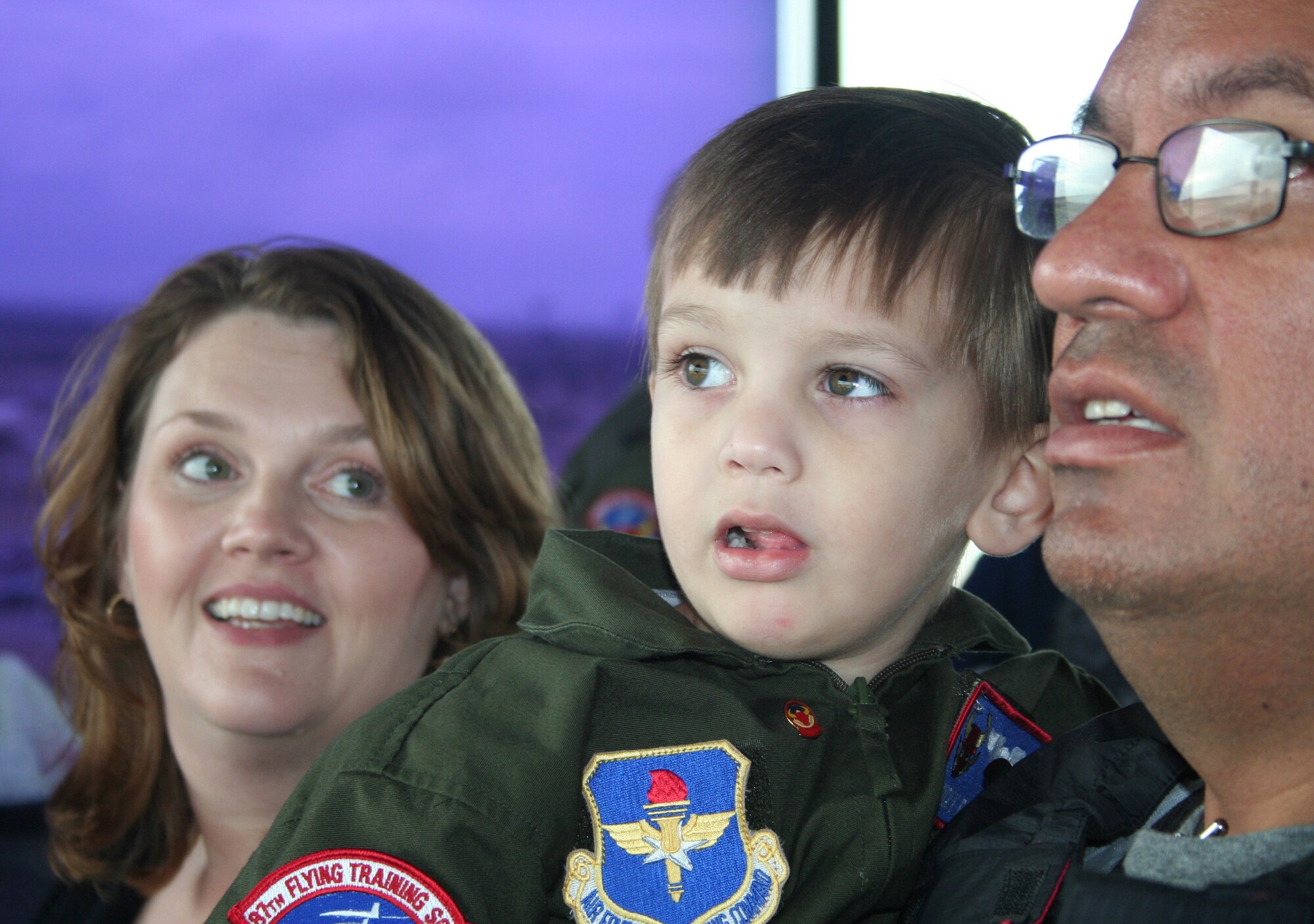 LAUGHLIN AIR FORCE BASE, Texas – Nicholas “Nicky” Pena and his family observe how a major airfield works from the Laughlin air traffic control tower during his Pilot for a Day activities here Nov. 20. Pena was able to participate in numerous activities during his big day including tours of the 87th Flying Training Squadron and Laughlin’s fire station. (Contributed photo)