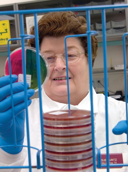 Sue Kuritz is a Microbiology veteran, applying her 19 years of knowledge to a variety of cultures that are grown to help medical personnel learn more about a patient’s condition.  (Air Force photo by Margo Wright)