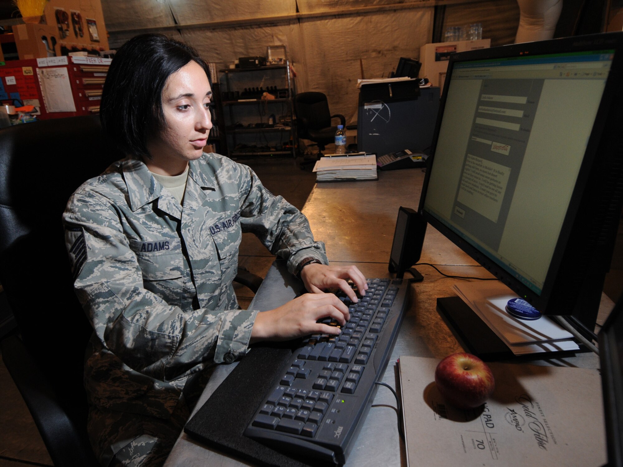Master Sgt. Linda Adams, 379th Expeditionary Aircraft Maintenance Squadron consolidated tool kit NCOIC, updates her blog, Nov. 24, 2009, which allows her to stay in touch with her students while deployed. In addition to being an Air Force reservist, Sergeant Adams is a teacher at Kate Shepard Elementary in Mobile, Ala. She is deployed from Keesler Air Force Base, Miss. in support of operations Iraqi Freedom and Enduring Freedom.
(U.S. Air Force Photo/Tech. Sgt. Jason W. Edwards) 
