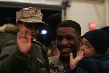 NEW YORK -- A Marine from 6th Communications Battalion, 4th Marine Logistics Group, Marine Forces Reserve, reunites after returning from his Iraq deployment, Nov. 25 just before the Thanksgiving Day holiday. (Official Marine Corps photo by Sgt. Randall A. Clinton)