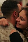 NEW YORK -- A Marine from 6th Communications Battalion, 4th Marine Logistics Group, Marine Forces Reserve, reunites after returning from his Iraq deployment, Nov. 25 just before the Thanksgiving Day holiday. (Official Marine Corps photo by Sgt. Randall A. Clinton)
