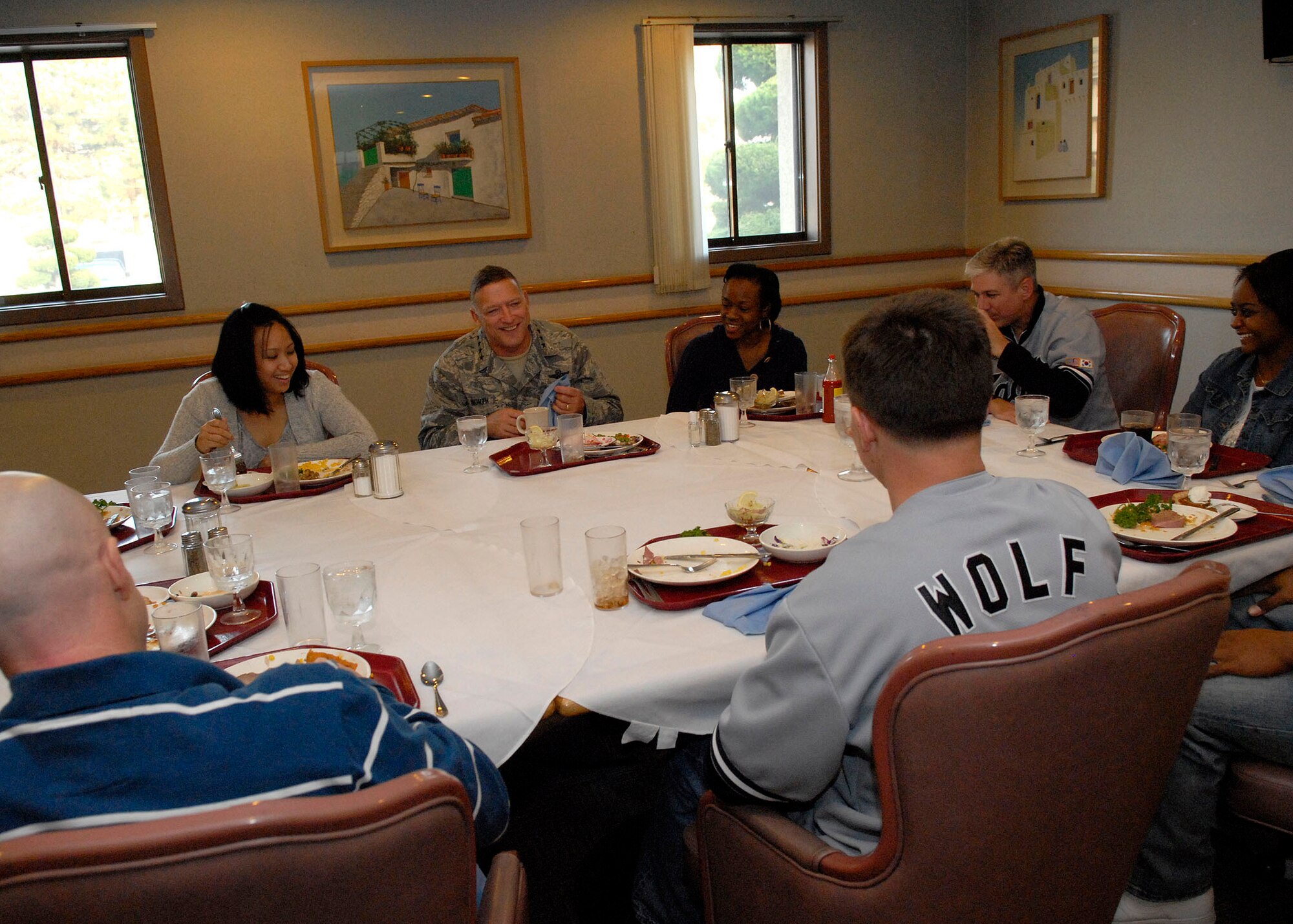 Gen. Gary North, Pacific Air Forces commander, has Thanksgiving dinner with 51st Fighter Wing Airmen Nov. 26 at Kunsan Air Base, Republic of Korea. General North, Chief Master Sgt. Brooke McLean, PACAF command chief, and four members of the Air Force Civilian Advisory Council toured Osan and Kunsan Air Bases, ROK, to celebrate Thanksgiving with the Airmen serving there. (U.S. Air Force photo/Tech. Sgt. Jerome Tayborn)