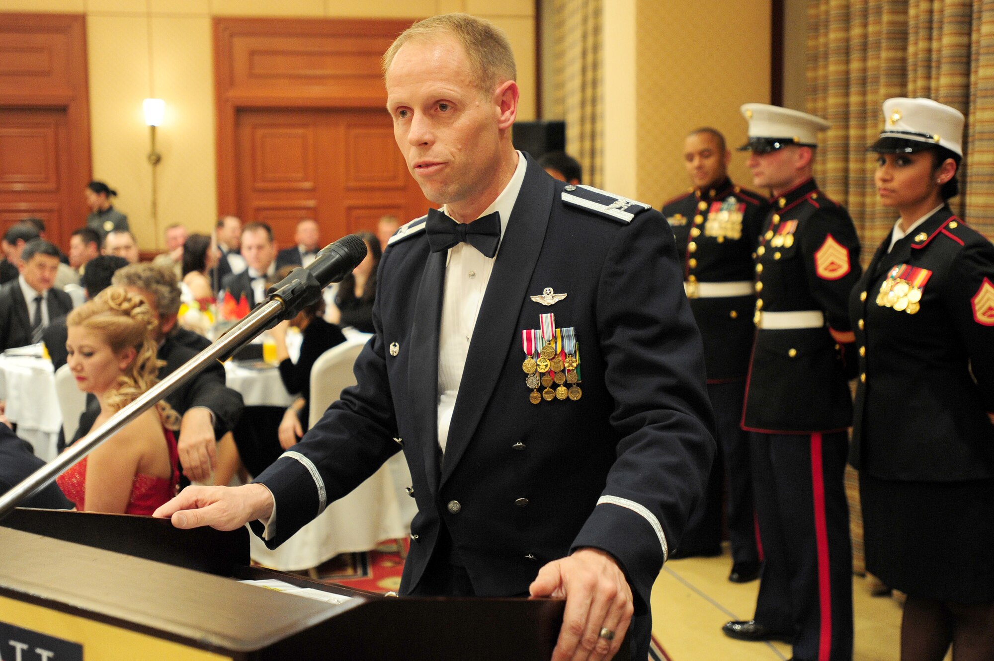 BISHKEK, Kyrgyzstan -- Col. Blaine Holt, 376th Air Expeditionary Wing commander, speaks at the Marine Corp Ball, Nov. 21, 2009. The U.S. Embassy Marine Detachment celebrated the Corps' 234th anniversary with a dinner and ceremony in Bishkek. Colonel Holt was the guest speaker for the event and shared his appreciation of the Marine's service to the U.S. (U.S. Air Force photo/Senior Airman Steele C. G. Britton)
