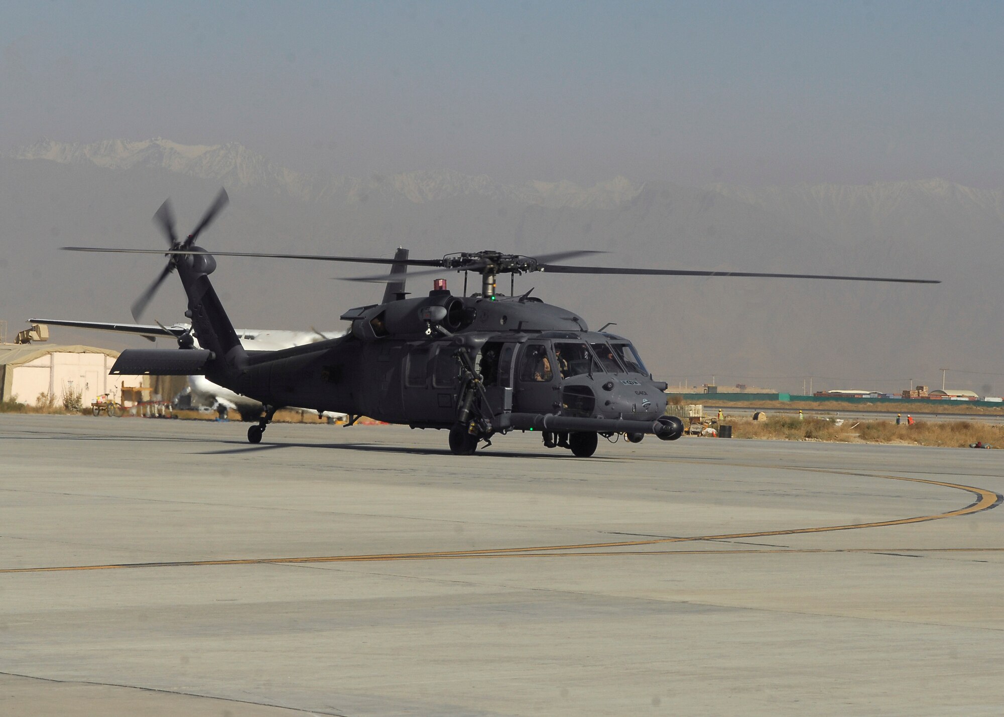 BAGRAM AIRFIELD, Afghanistan -- The 33rd Expeditionary Rescue Squadron operates a highly modified version of the Blackhawk helicopter, the HH-60G Pave Hawk, pictured here, and is deployed from Kadena Air Base, Japan. (U.S. Air Force photo/Tech. Sgt. John Jung)