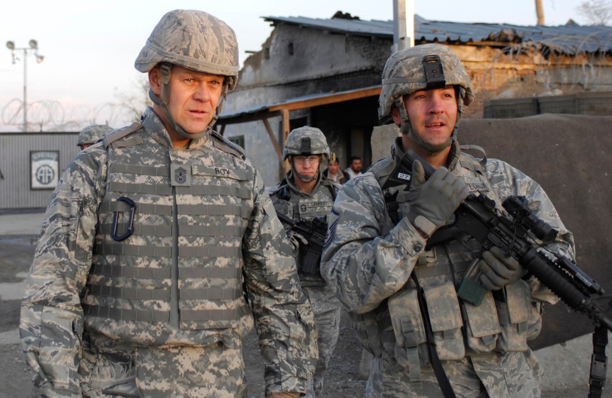 BAGRAM AIRFIELD, Afghanistan -- Chief Master Sgt. of the Air Force James A. Roy views the town outside of one of the entry points at Bagram with Master Sgt. Robert Danylchuck, 455th Expeditionary Security Forces, noncommissioned officer in charge, Alpha sector.  Chief Roy visited Bagram to talk with Airmen from the 455th Expeditionary Security Forces Squadron to hear what the Airmen had on their minds in a deployed environment. "I wanted to also thank you, your spouses and your family for the sacrifices you and they are making while you are deployed defending our nation," he said.  Sergeant Danylchuck is a 17-year Air Force veteran deployed from Davis-Monthan Air Force Base, Ariz.  (U.S. Air Force photo/Tech. Sgt. John Jung) 