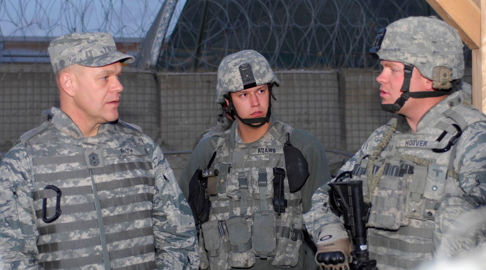 BAGRAM AIRFIELD, Afghanistan -- Chief Master Sgt. of the Air Force James A. Roy talks to Staff Sgt. Thomas Hoover, deployed from McChord Air Force Base, Wash.  Chief Roy wanted to talk with Airmen from the 455th Expeditionary Security Forces Squadron to hear what the Airmen had on their minds in a deployed environment. "I wanted to also thank you, your spouses and your family for the sacrifices you and they are making while you are deployed defending our nation," he said.  The 455th ESFS is the largest security forces squadron outside the United States. (U.S. Air Force photo/Tech. Sgt. John Jung)