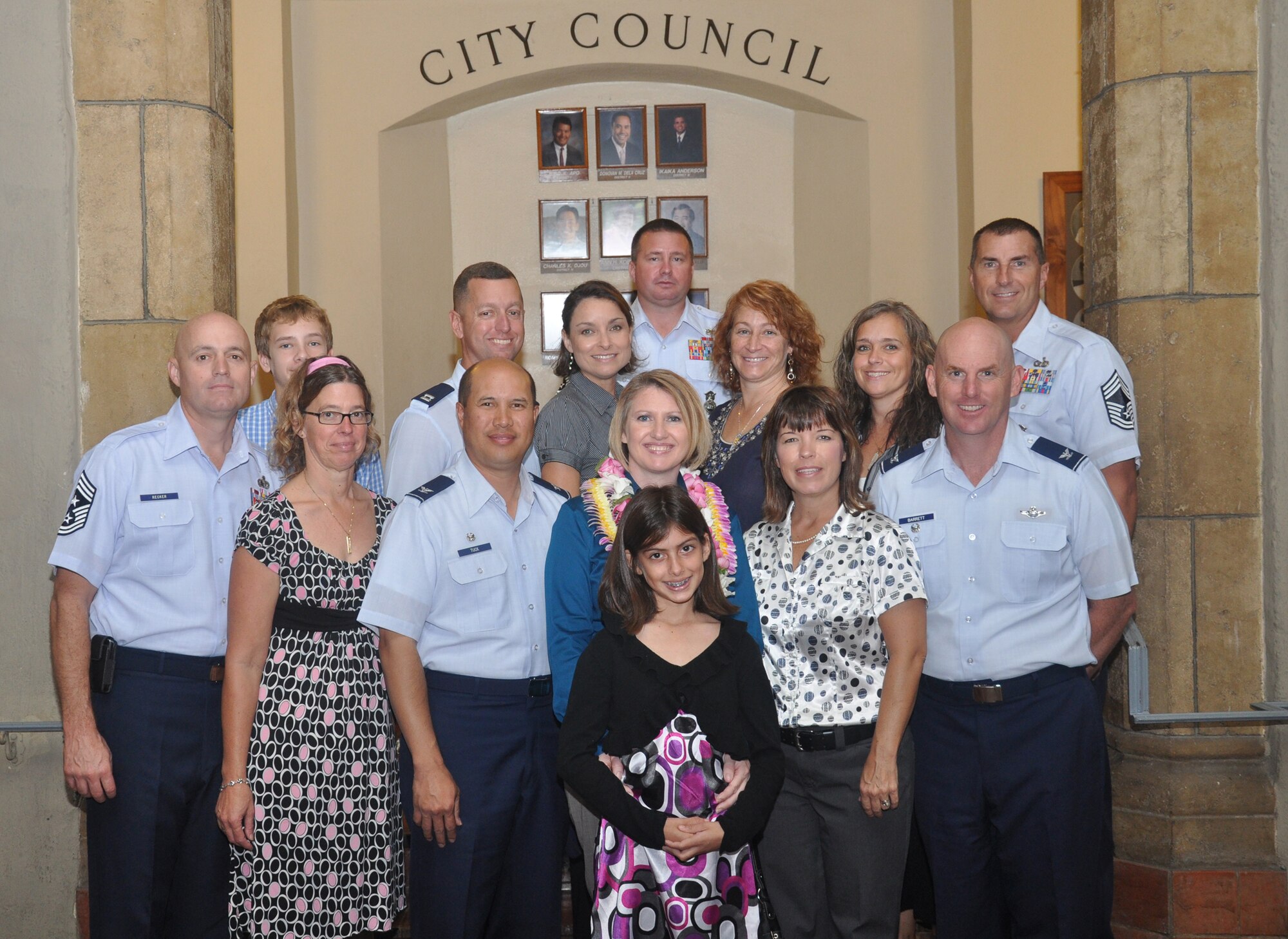 HICKAM AIR FORCE BASE, Hawaii -- The Navy League and Hickam leadership recognized Key Spouse Sharron Ortiz (front/center), a Key Spouse from the 15th Security Forces Squadron, whose husband, Master Sgt. David Ortiz, is currently deployed.She is the only Key Spouse for 182 deployed Airmen in the unit, 88 of whom are first-term Airmen with 21 spouses under the age of 20. (U.S. Air Force photo by Staff Sgt. Carolyn Viss)