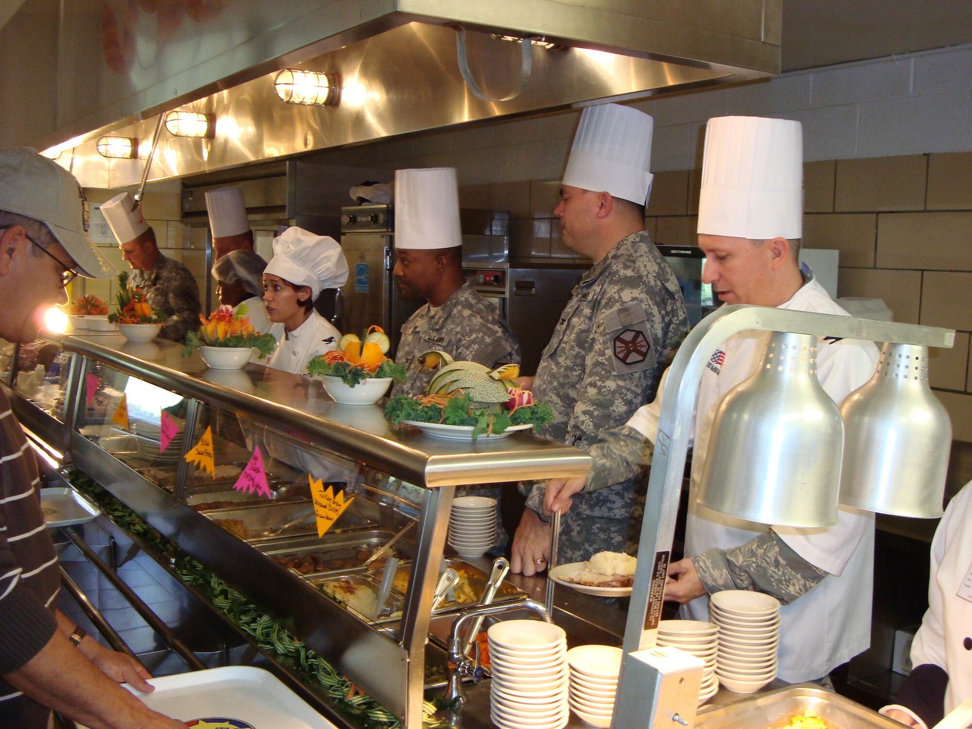 Joint Base McGuire-Dix-Lakehurst senior leadership man the serving line for the first JB MDL Thanksgiving holiday meal, Nov. 26 here. Hot meals were served to  the troops at dining facilities on McGuire and Dix. (U.S. Air Force photo/Angel Lopez)