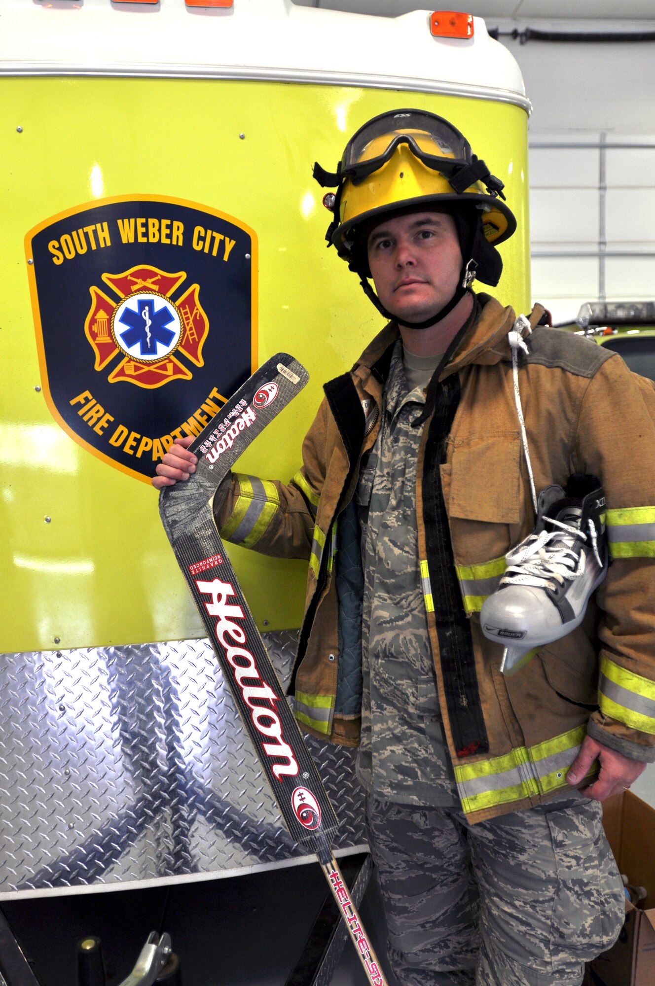 Senior Airman Scott Gatewood of the 419th Military Personnel Flight shows some of the many hats he wears. Whether serving his country though the Air Force Reserve, serving his neighbors as a volunteer firefighter with the South Weber Fire Department, or volunteering on his children’s junior hockey team, Airman Gatewood exemplifies the Air Force core value of “service before self.” (U.S. Air Force photo/Staff Sgt. Kyle Brasier)