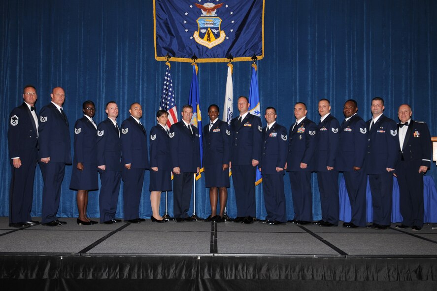 McGHEE TYSON AIR NATIONAL GUARD BASE, Tenn. -- NCO Academy Class 10-1, D-Flight, gathers after receiving their graduation diplomas at the I.G. Brown Air National Guard Training and Education Center here, Nov. 19, 2009.  Pictured from L-R are Senior Master Sgt. Tim Kumes, EPME director of education, Tech. Sgt. Everett J. Skinner, Tech. Sgt. Yolonda C. Davis, Tech. Sgt. Glenn J. Ferguson, Tech. Sgt. Joseph Guerrero, Tech. Sgt. Jodi L. Habbinger, Tech. Sgt. Bruce E. Hurley, Tech. Sgt. Keisha S. McCormick, Tech. Sgt. Joseph B. Prouse, Tech. Sgt. Shane L. Schuelke, Tech. Sgt. John C. Scobie, Staff. Sgt. Travis A. Swihart, Tech. Sgt. Bradley L. Tabron, Tech. Sgt. Robert F. Walsh, and Lt. Col. Stan Giles, guest speaker.   (U.S. Air Force photo by Master Sgt. Kurt Skoglund/Released)