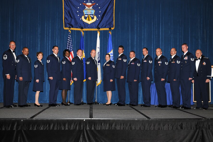 McGHEE TYSON AIR NATIONAL GUARD BASE, Tenn. -- NCO Academy Class 10-1, B-Flight, gathers after receiving their graduation diplomas at The I.G. Brown Air National Guard Training and Education Center here, Nov. 19, 2009.  Pictured from L-R are Senior Master Sgt. Tim Kumes, EPME director of education, Tech. Sgt. Jose D. Hernandez, Tech. Sgt. Melissa A. Bowton, Tech. Sgt. Bradley C. Chase, Tech. Sgt. Tammy Y. George, Tech. Sgt. Sean P. Gerdemann, Tech. Sgt. Michael S. Hoffman, Tech. Sgt. Laura K. Mancuso, Tech. Sgt. Conal McBride, Tech. Sgt. Thomas J. Mills, Jr., Tech. Sgt. Matthew F. Phelps, Tech. Sgt. Andrew R. Straw, Tech. Sgt. Steven W. Thurman, Tech. Sgt. Casey B. Walsh, and Lt. Col. Stan Giles, guest speaker.   (U.S. Air Force photo by Master Sgt. Kurt Skoglund/Released)