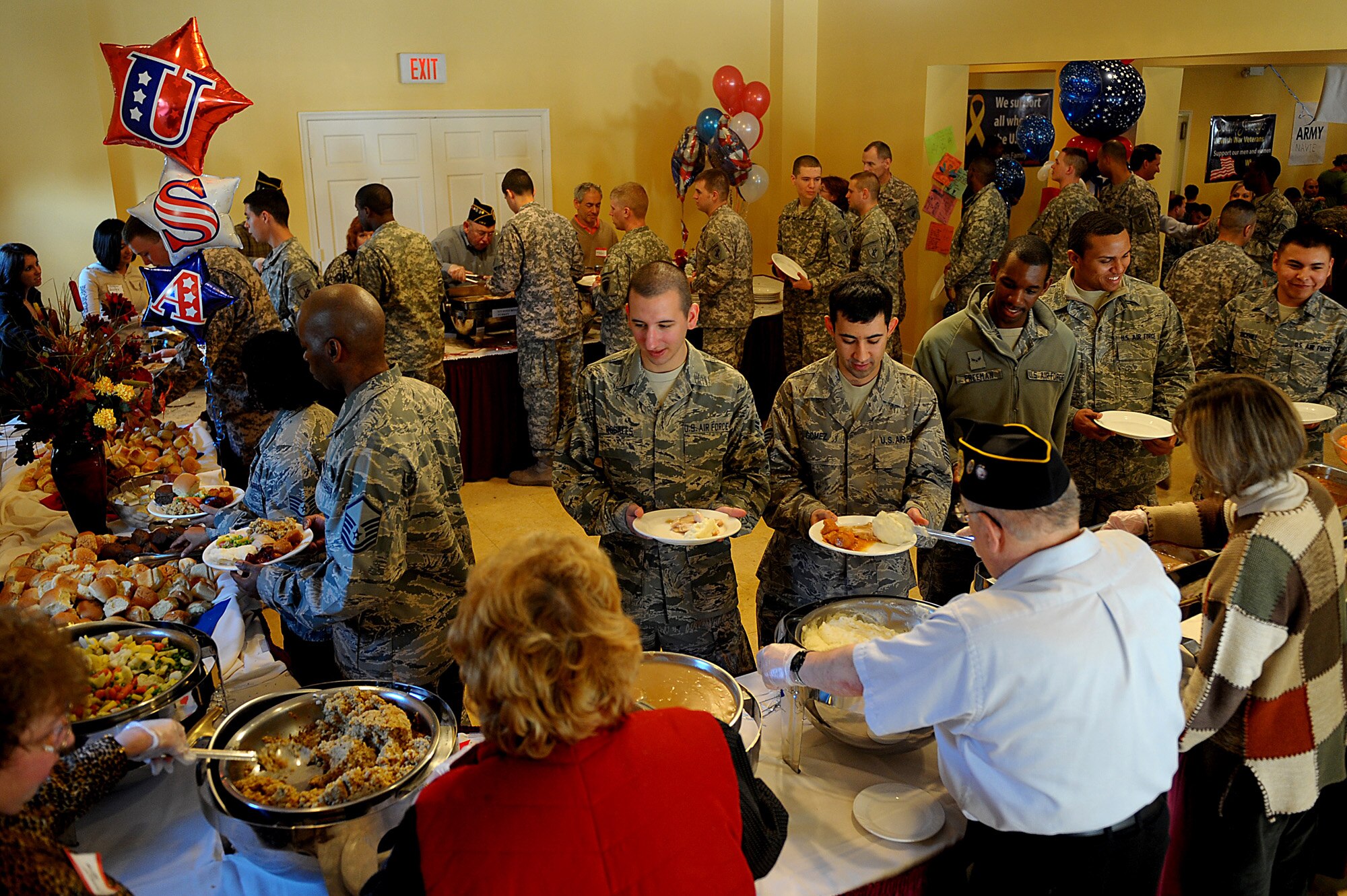 Airmen, Soldiers and Sailors took a break from the combat training field at Joint Base McGuire-Dix-Lakehurst, N.J., Nov. 26 to indulge in a Thanksgiving Day feast with supporters of the military from the local community.
(U.S. Air Force Photo/ Senior Airman Nicholas Pilch)(RELEASED)