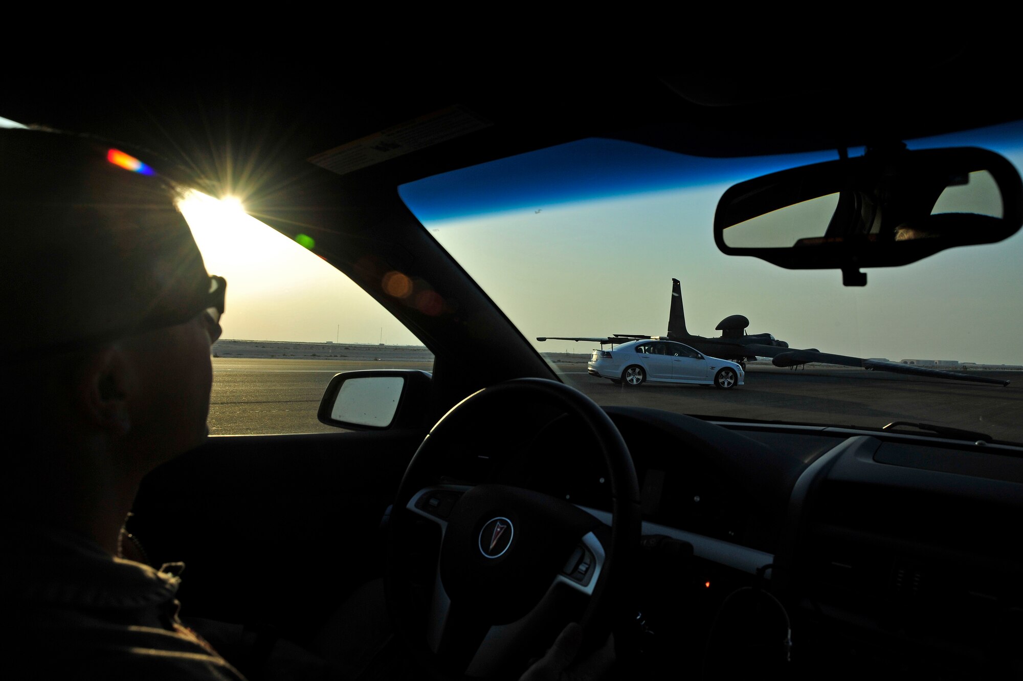 SOUTHWEST ASIA - Maj. Mark Mount, 99th Expeditionary Reconnaissance Squadron, performs air boss duties during the landing of a U-2 Dragonlady Nov. 25, 2009. Major Mount oversaw the landing of Major Shontz's 1000th hour flight in the U-2 aircraft. (U.S. Air Force photo/Tech. Sgt. Charles Larkin Sr)