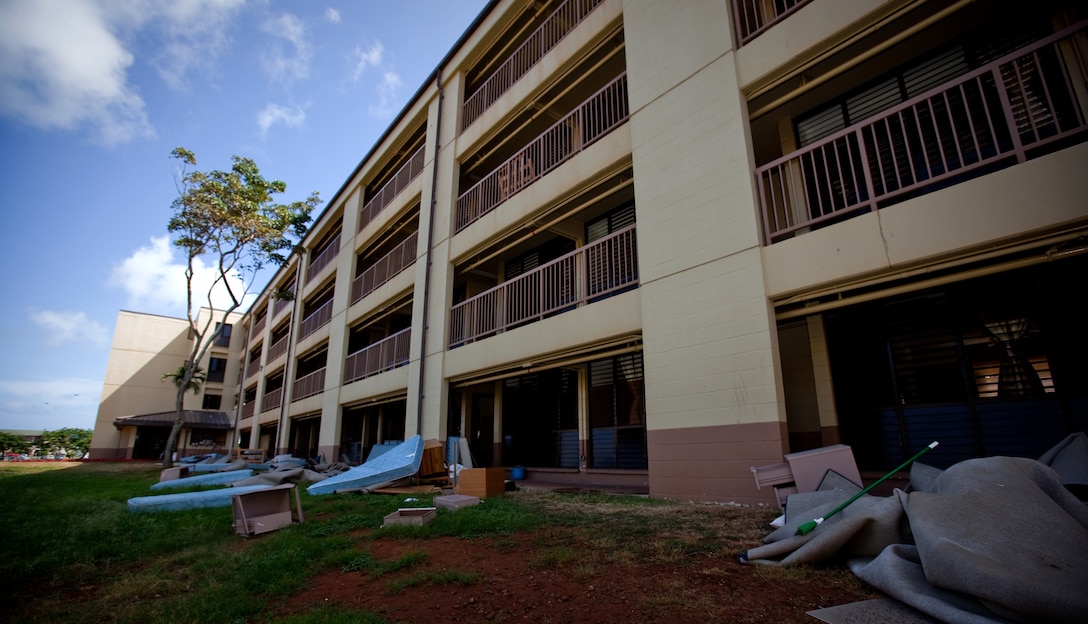 MCB HAWAII - Debris litters the front of Barracks 5070 Oct. 1 aboard MCB Hawaii, Kaneohe Bay. The barracks near completion of safety and fire renovations Oct. 18, only four months after beggining in mid-July. (Official U.S. Marine Corps photo by Cpl. Achilles Tsantarliotis)(Released)