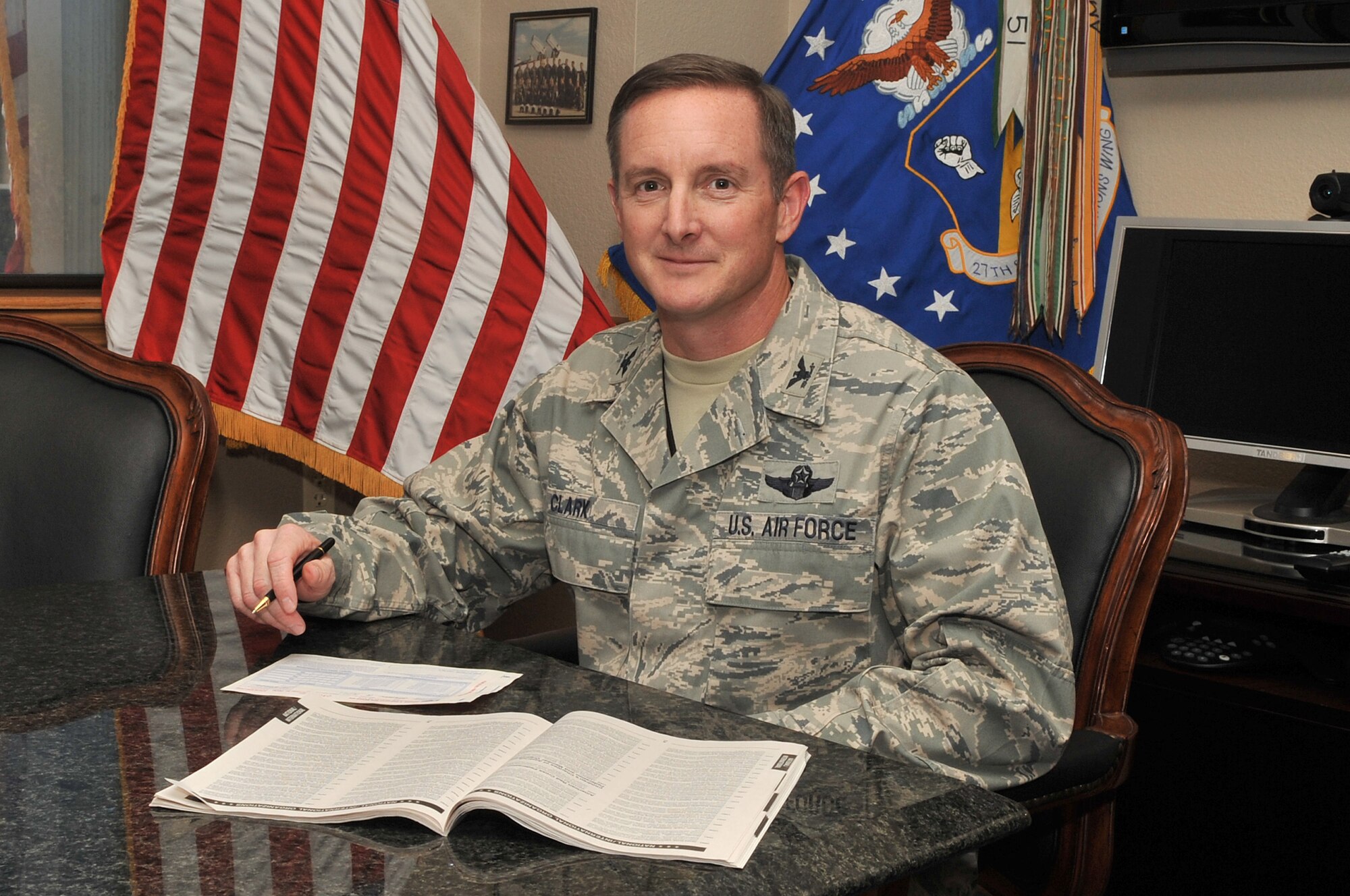 CANNON AIR FORCE BASE, N.M.--Col. Stephen Clark, 27th Special Operations Wing commander contributes to the Combined Federal Campaign Oct. 1. The CFC is the largest and most successful workplace fundraiser in the world. Cannon AFB has a $90,000 goal during it's CFC window of Oct. 5 to Nov. 16. (U.S. Air Force photo by Staff Sgt. Heather R. Redman/RELEASED) 