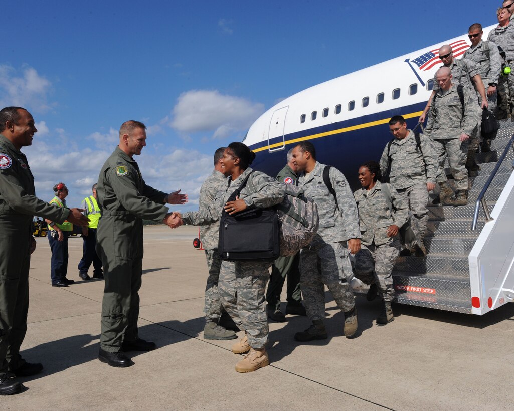 LANGLEY AIR FORCE BASE, Va. --  Group and squadron commanders greet Airmen returning from a 120-day deployment to Kadena Air Base, Japan Oct. 1. The goal of the deployment was to support the Pacific Theater Security Package and ensure stability in the region. (U.S. Air Force photo/Airman Rebecca Montez) 