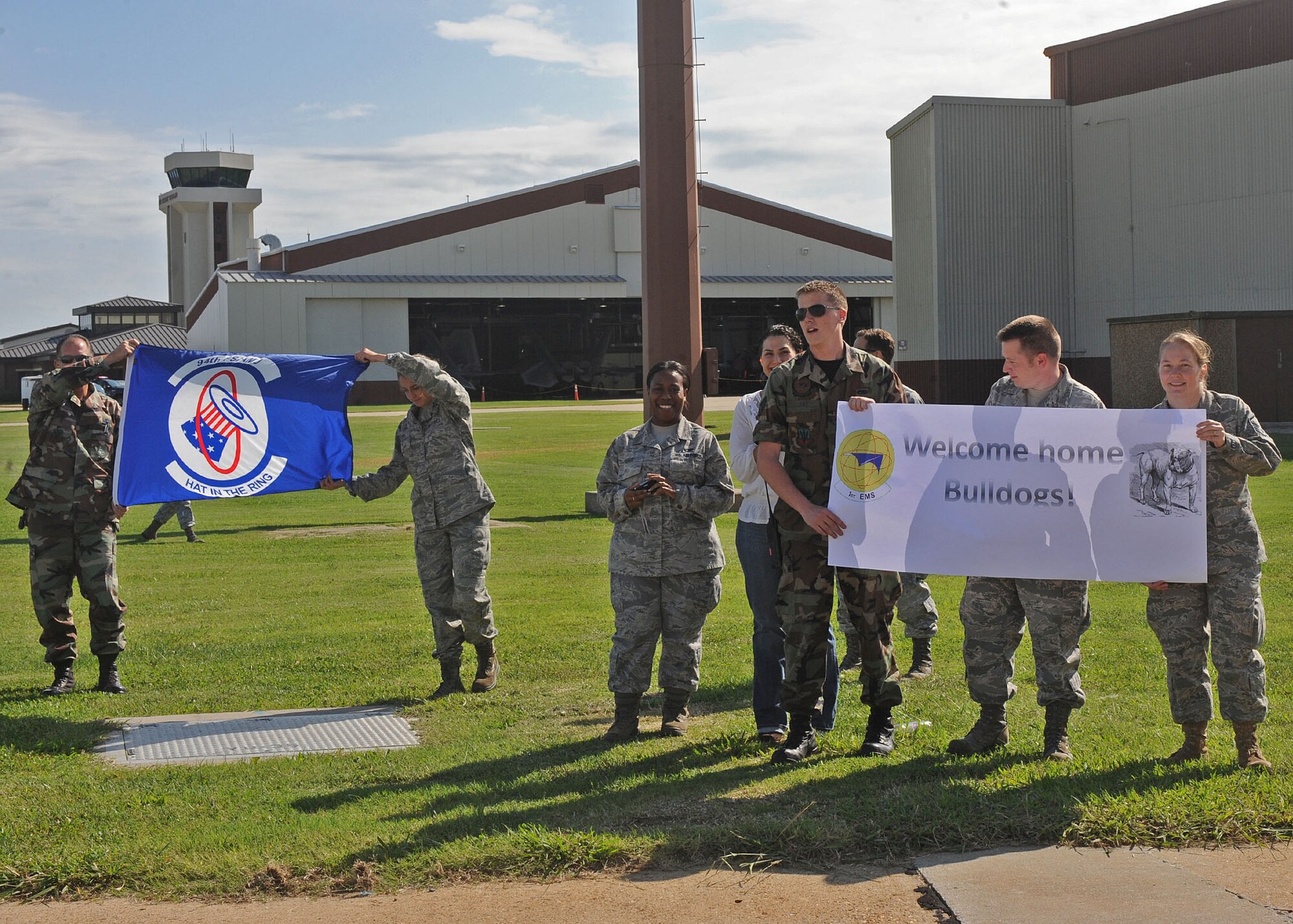 LANGLEY AIR FORCE BASE, Va. --  Members of the 94th Fighter Squadron and the 1st Equipment Maintenance Squadron welcome home Airmen returning from a 120-day deployment to Kadena Air Base, Japan. The goal of the deployment was to support the Pacific Theater Security Package and ensure stability in the region. (U.S. Air Force photo/Airman Rebecca Montez)