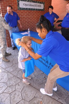 “Air Force brat” dog tags were one of the souvenirs the children received  for participating in Operation KUDOS. U. S. Air Force photo by Gary Cutrell