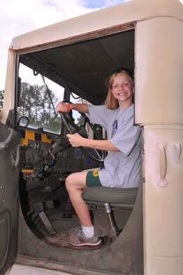 KUDOS participants got a turn behind the wheel of a 5th Combat Communications Squadron vehicle. U. S. Air Force photo by Gary Cutrell