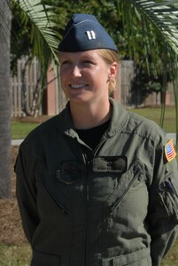Capt. Kari Fleming is the Airman who was identified as the individual who helped direct traffic along the Don Holt Bridge during a rush hour traffic accident Sept. 28.  She along with two civilians guided other motorists to the side of the road to allow Emergency Medical Service crews to reach the accident site. Captain Fleming is a pilot with the 15th Airlift Squadron. (U.S. Air Force photo/Tech. Sgt. Jennifer Arredondo)