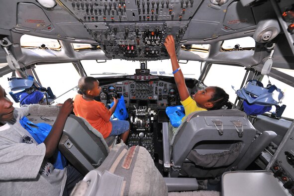 KUDOS participants  were given a hands-on tour of the cockpit of the E-8C JSTARS aircraft. U. S. Air Force photo by Gary Cutrell