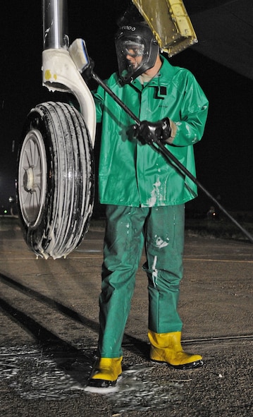 An Airman from the 2d Maintenance Squadron uses a scrub pad to remove the dirt, grease and grime from surface of the B-52H Stratofortress’ wheel during a scheduled wash Sept. 10. During a routine wash, Airmen will use an estimated 20 scrub pads and 15 large magic erasers. (Air Force photo by Senior Airman Alexandra Longfellow) (RELEASED)