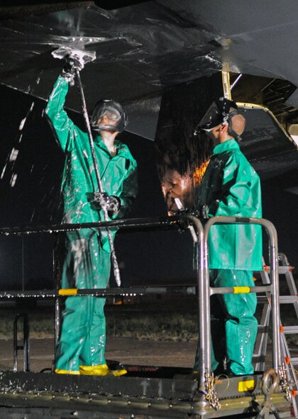 An Airman from the 2d Maintenance Squadron uses a scrub pad to remove the dirt, grease and grime from surface of the B-52H Stratofortress’ wheel during a scheduled wash Sept. 10. During a routine wash, Airmen will use an estimated 20 scrub pads and 15 large magic erasers. (Air Force photo by Senior Airman Alexandra Longfellow) (RELEASED)