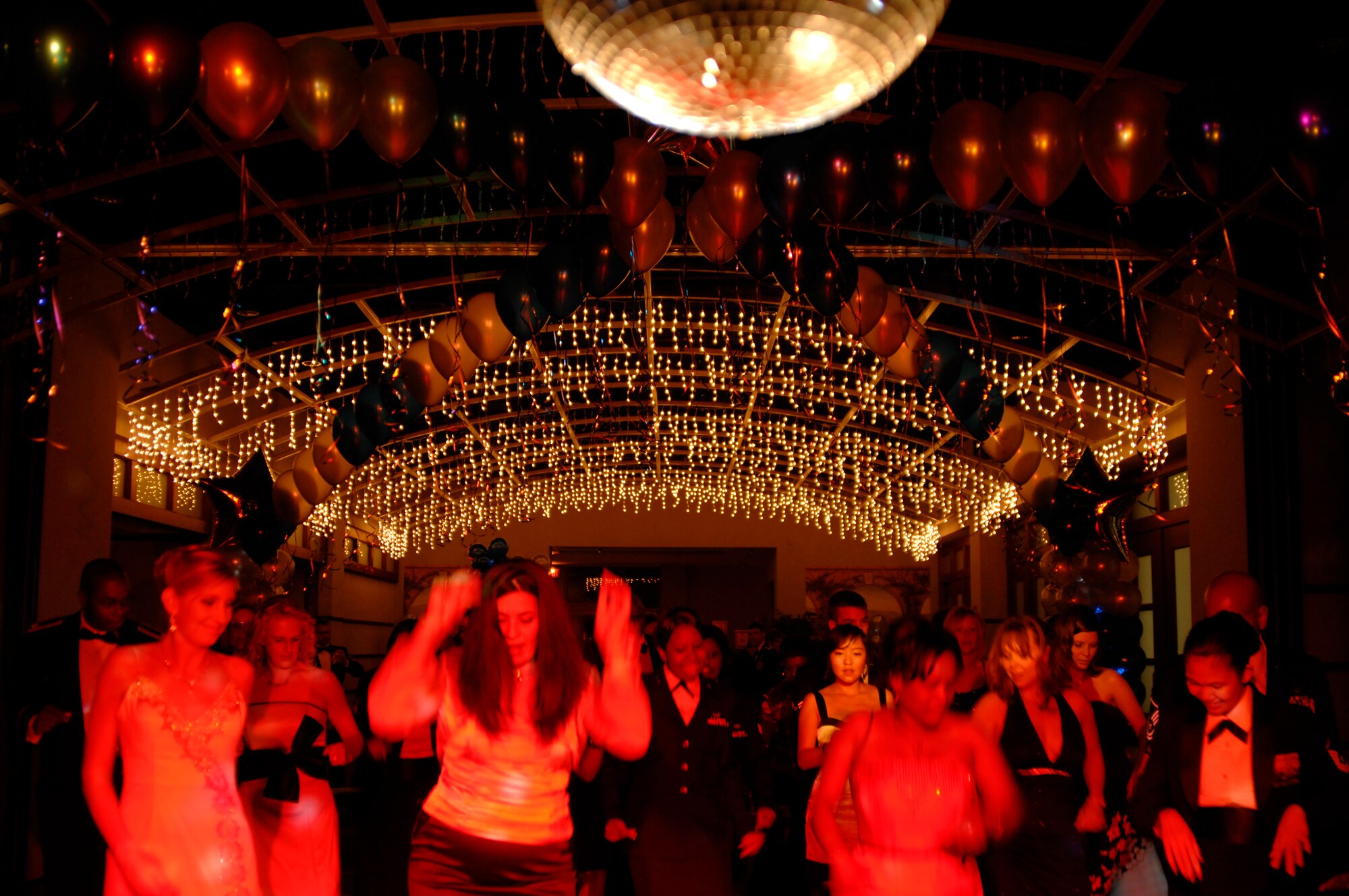 Team McConnell members and guests dance during the Air Force Ball at McConnell Air Force Base, Kan., Sept. 25, 2009. The 22nd Air Refueling Wing celebrated the Air Force's 62nd anniversary with a theme “Year of the KC-135.”(U.S. Air Force photo/Senior Airman Laura Suttles)