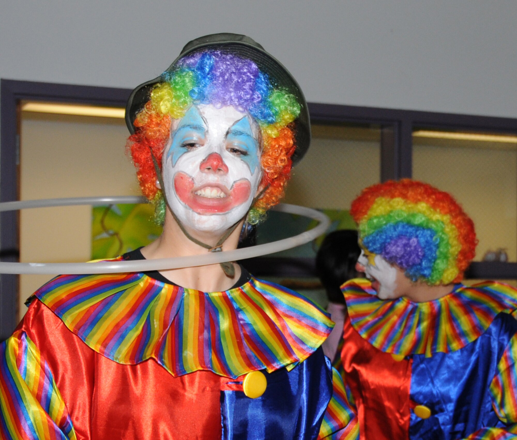 Airmen Basic Aubrey Gregoire and Paula Clark, 334th Training Squadron, volunteered as clowns.  (U.S. Air Force photo by Kemberly Groue)