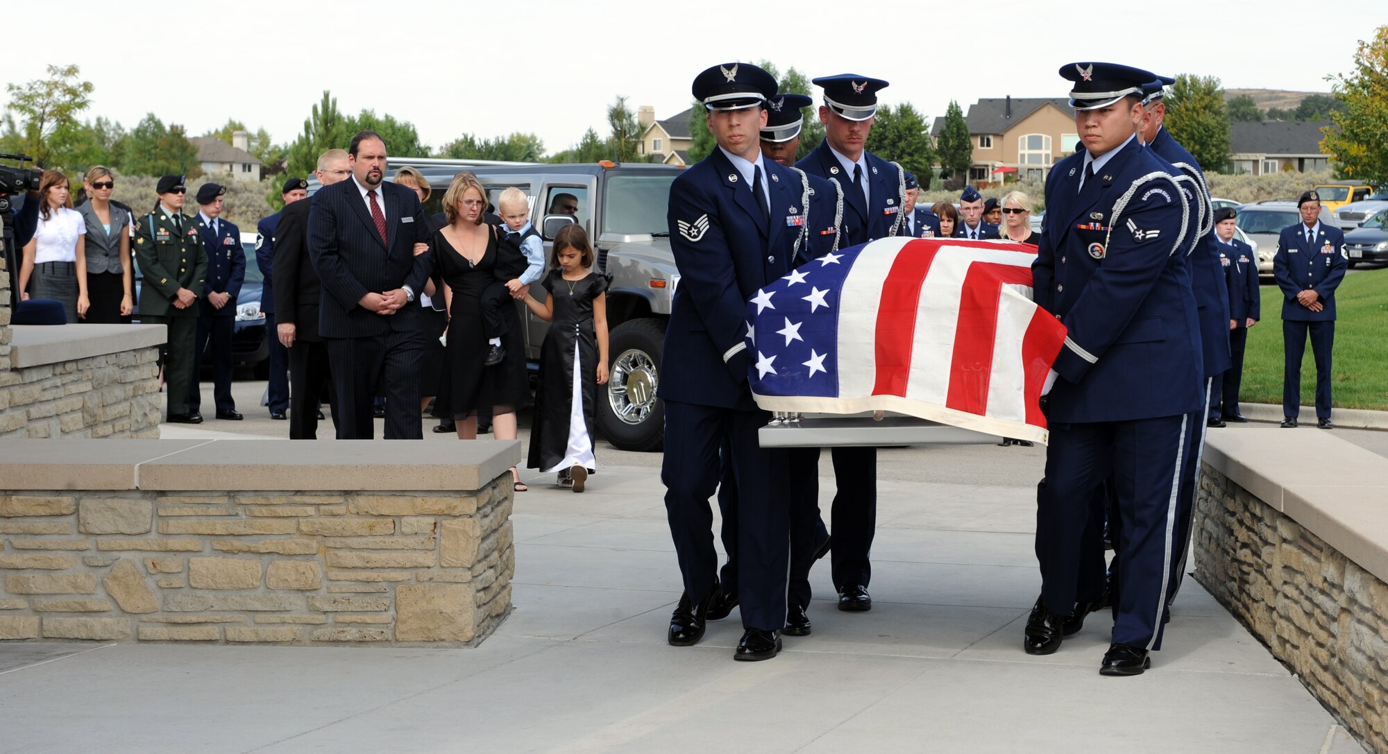 BOISE, Idaho -- Base honor guard members carry the casket of Senior Airman Matthew Courtois during a funeral service in Boise, Idaho, Sept. 28. Airman Courtois, 366th Security Forces Squadron, 22, of Lucas, Texas, died Sept. 20 as a result of non-combat related injuries while on duty deployed in Southwest Asia. The circumstances surrounding the incident are under investigation. (U.S. Air Force photo by Airman 1st Class Debbie Lockhart)
