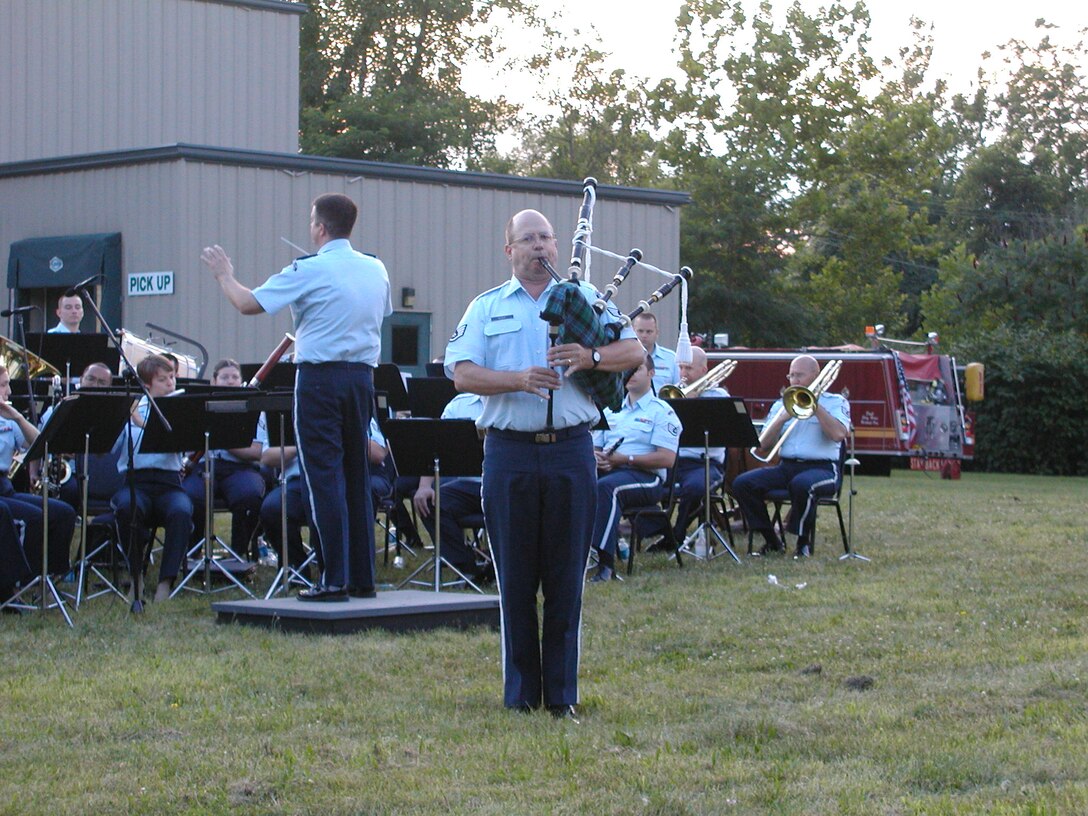 ANG Band of the Mid-Atlantic Concert Band performs a concert at the Bridgeville Volunteer Fire Department in Bridgeville PA on Wednesday July 8, 2009.  Pictured is Staff Sergeant Timothy Ross performing on bagpipes.