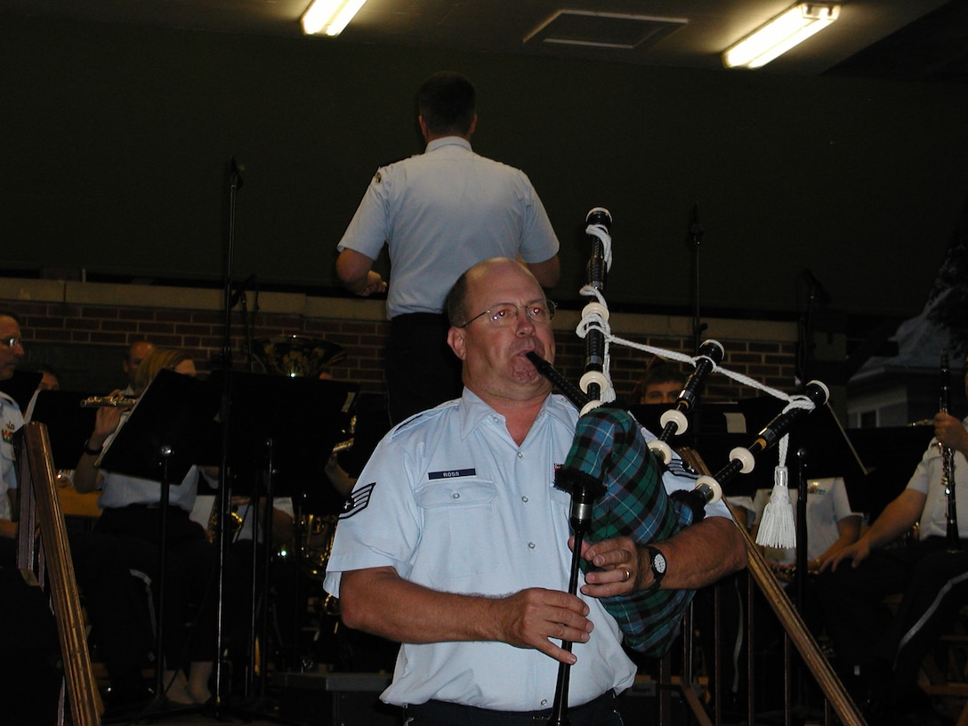 ANG Band of the Mid-Atlantic Concert Band performs a concert at Bandstand Park in Franklin PA on Sunday July 5, 2009.  Pictured is Staff Sergeant Timothy Ross performing on bagpipes.