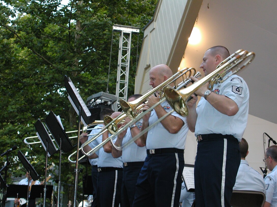 ANG Band of the Mid-Atlantic Concert Band performs for a concert at Lititz Springs Park in Lititz Pennsylvania on Tuesday June 30, 2009.  The trombone section performs a feature.