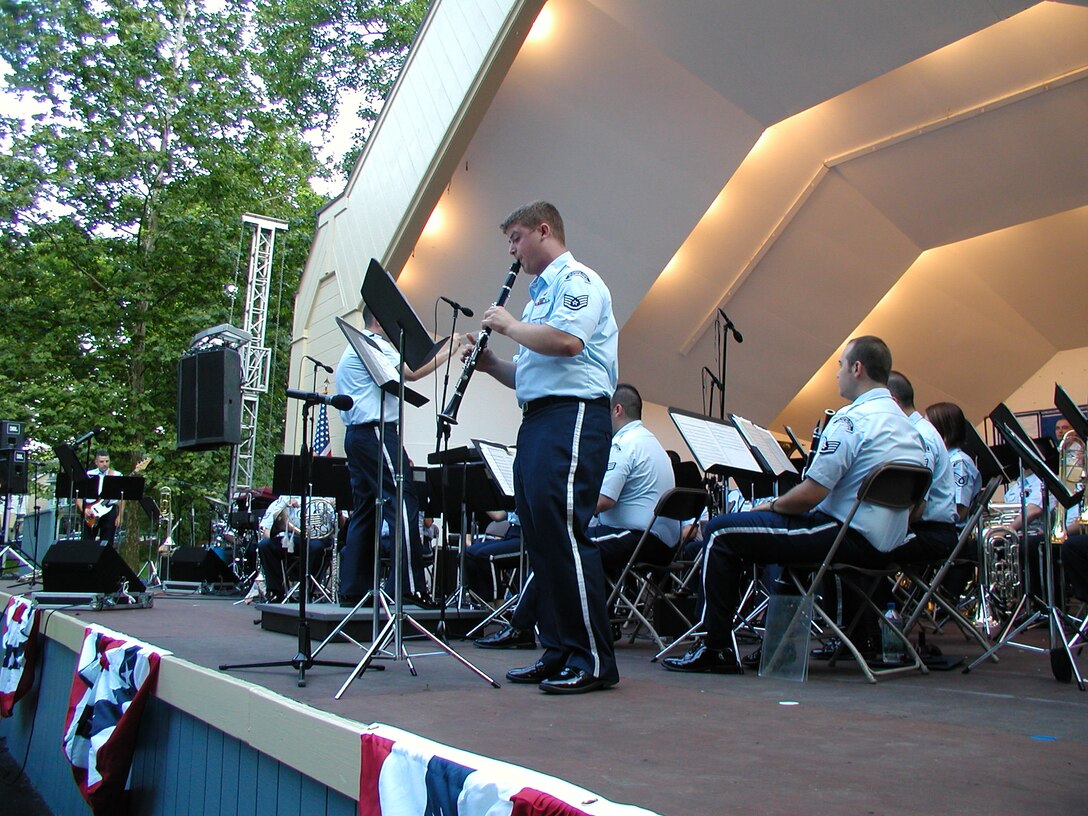 ANG Band of the Mid-Atlantic Concert Band performs for a concert at Lititz Springs Park in Lititz Pennsylvania on Tuesday June 30, 2009.  Staff Sergeant Thomas Strawley performs a clarinet solo.