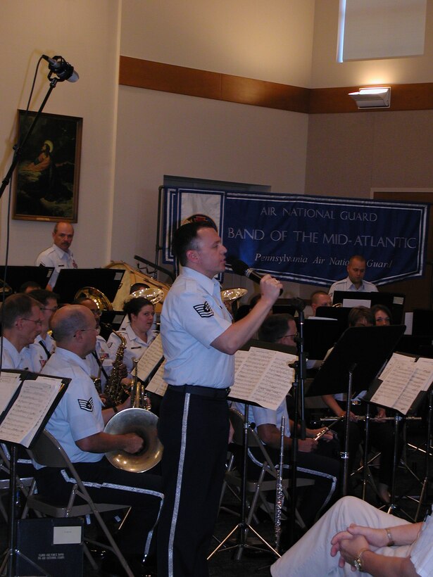 ANG Band of the Mid-Atlantic Concert Band performs for a concert at Nicarry Meeting House in New Oxford PA on Saturday June 27, 2009.  Technical Sergeant Brian Stike is speaking.
